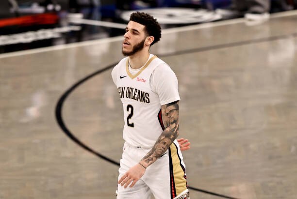 NEW YORK, NEW YORK - APRIL 07:  Lonzo Ball #2 of the New Orleans Pelicans reacts to his three point shot in the second half against the Brooklyn Nets at Barclays Center on April 07, 2021 in New York City.NOTE TO USER: User expressly acknowledges and agrees that, by downloading and or using this photograph, User is consenting to the terms and conditions of the Getty Images License Agreement. (Photo by Elsa/Getty Images)