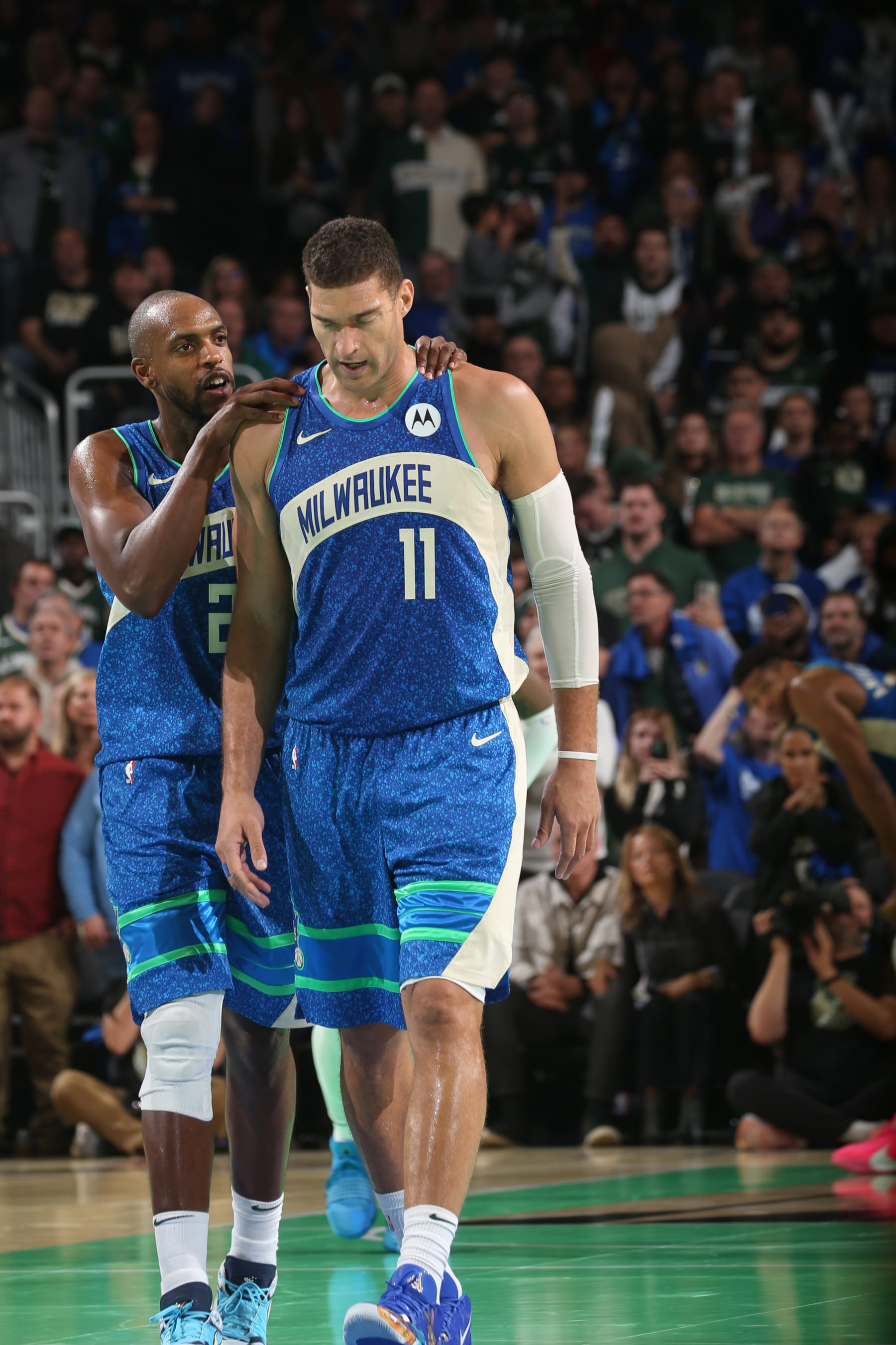 MILWAUKEE, WI - NOVEMBER 3: Khris Middleton #22 and Brook Lopez #11 of the Milwaukee Bucks celebrate during the In Season Tournament against the New York Knicks on November 3, 2023 at the Fiserv Forum Center in Milwaukee, Wisconsin. NOTE TO USER: User expressly acknowledges and agrees that, by downloading and or using this Photograph, user is consenting to the terms and conditions of the Getty Images License Agreement. Mandatory Copyright Notice: Copyright 2023 NBAE (Photo by Gary Dineen/NBAE via Getty Images).