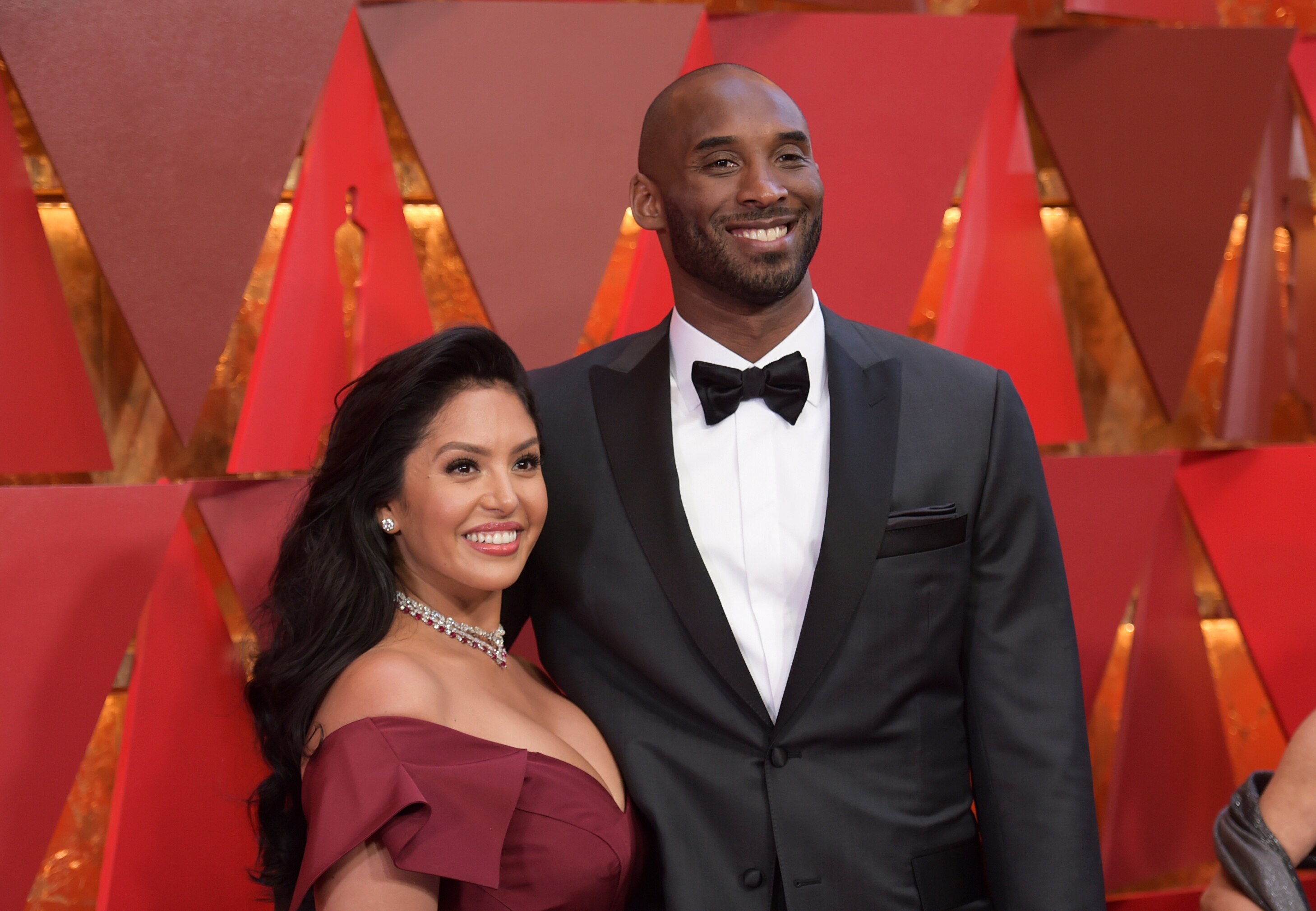 FILE - In this March 4, 2018, file photo, Vanessa Bryant, left, and Kobe Bryant arrive at the Oscars in Los Angeles. Vanessa Bryant on Wednesday, March 17, 2021, posted the names of four Los Angeles County sheriff's deputies she alleges took and shared graphic photos from the site of the helicopter crash that killed her husband, their daughter, Gianna, and seven others. (Photo by Richard Shotwell/Invision/AP, File)