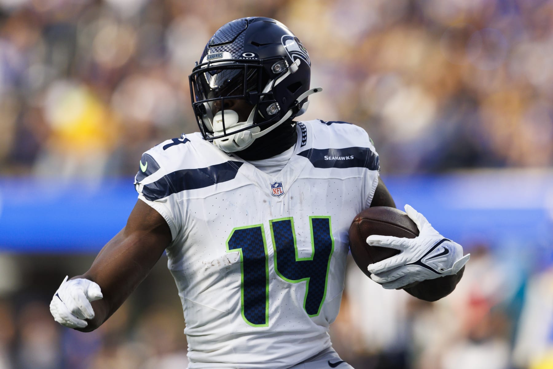 INGLEWOOD, CALIFORNIA - NOVEMBER 19: DK Metcalf #14 of the Seattle Seahawks runs after the catch during a game against the Los Angeles Rams at SoFi Stadium on November 19, 2023 in Inglewood, California. (Photo by Ric Tapia/Getty Images)