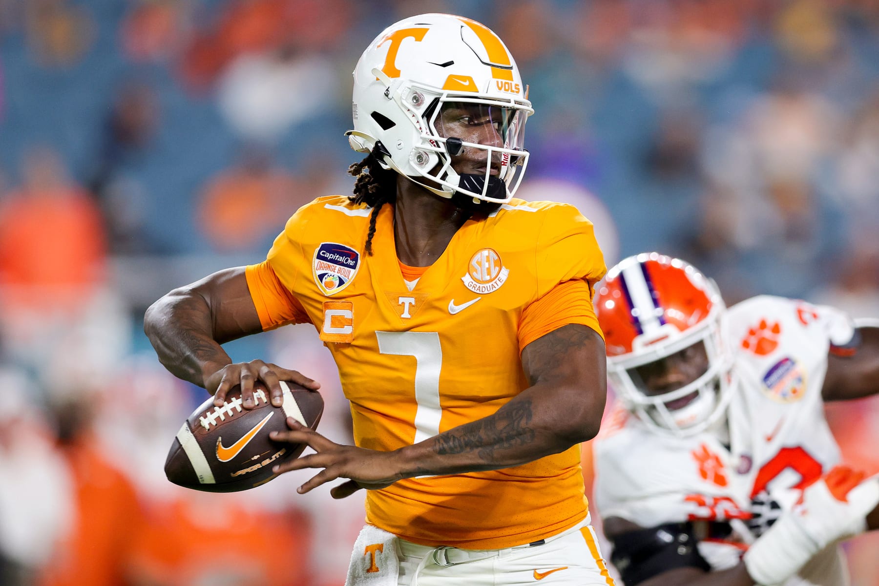 MIAMI GARDENS, FLORIDA - DECEMBER 30: Joe Milton III #7 of the Tennessee Volunteers throws a pass against the Clemson Tigers during the first quarter of the Capital One Orange Bowl at Hard Rock Stadium on December 30, 2022 in Miami Gardens, Florida. (Photo by Megan Briggs/Getty Images)