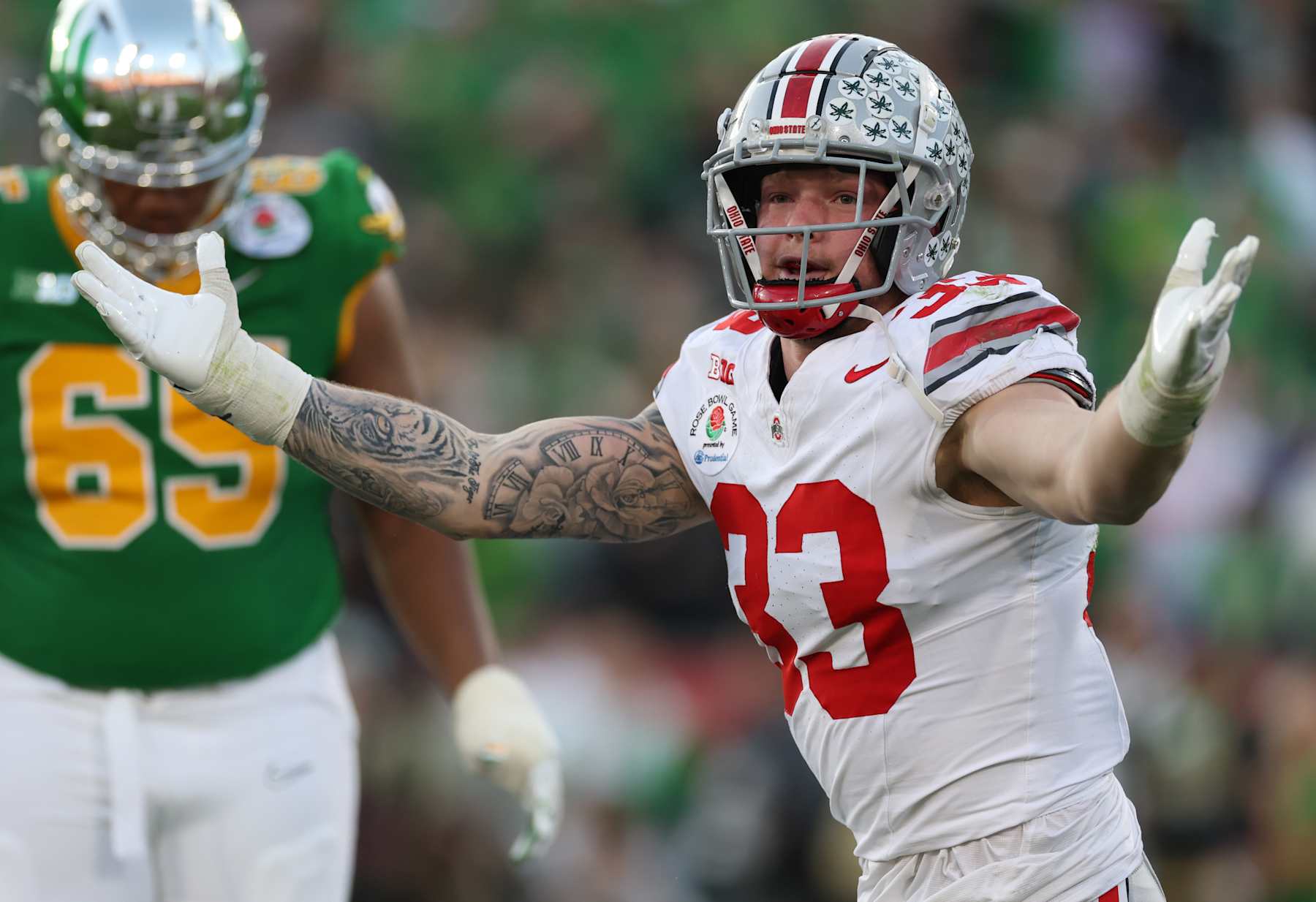 PASADENA, CALIFORNIA - JANUARY 01: Jack Sawyer #33 of the Ohio State Buckeyes reacts during the third quarter against the Oregon Ducks during the Rose Bowl Game Presented by Prudential at Rose Bowl Stadium on January 01, 2025 in Pasadena, California. (Photo by Sean M. Haffey/Getty Images)