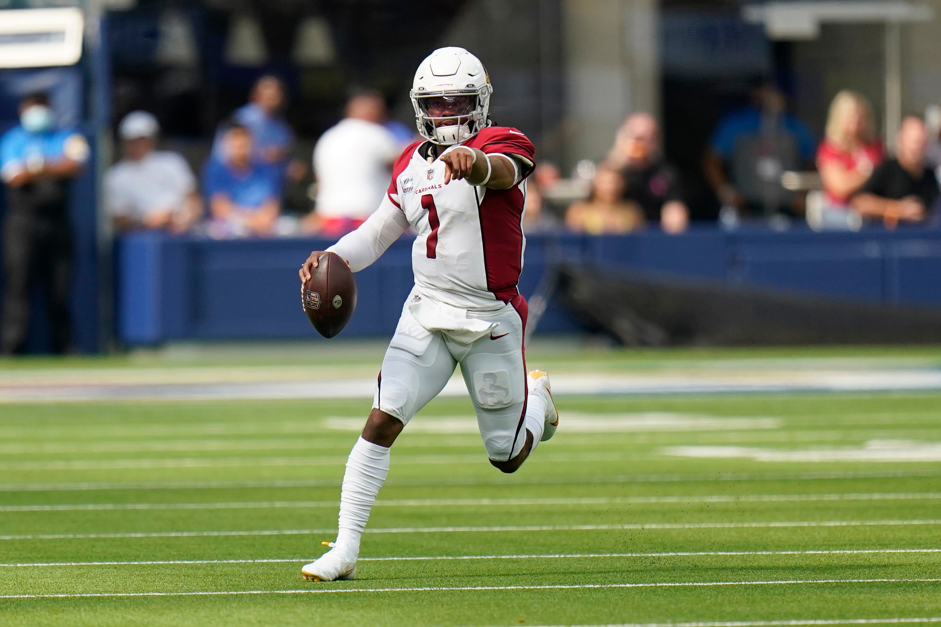 Arizona Cardinals quarterback Kyler Murray runs during the first half in an NFL football game against the Los Angeles Rams Sunday, Oct. 3, 2021, in Inglewood, Calif. (AP Photo/Jae C. Hong)