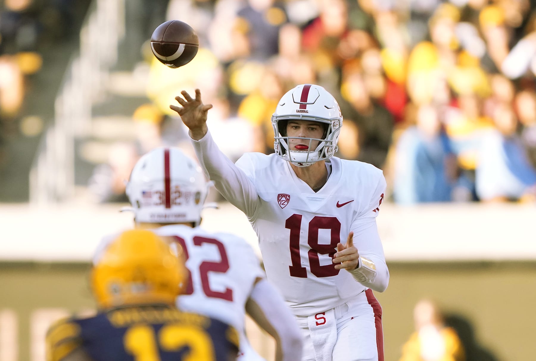 BERKELEY, CALIFORNIA - NOVEMBER 19: Tanner McKee #18 of the Stanford Cardinal throws a pass against the California Golden Bears during the first quarter at California Memorial Stadium on November 19, 2022 in Berkeley, California. (Photo by Thearon W. Henderson/Getty Images)