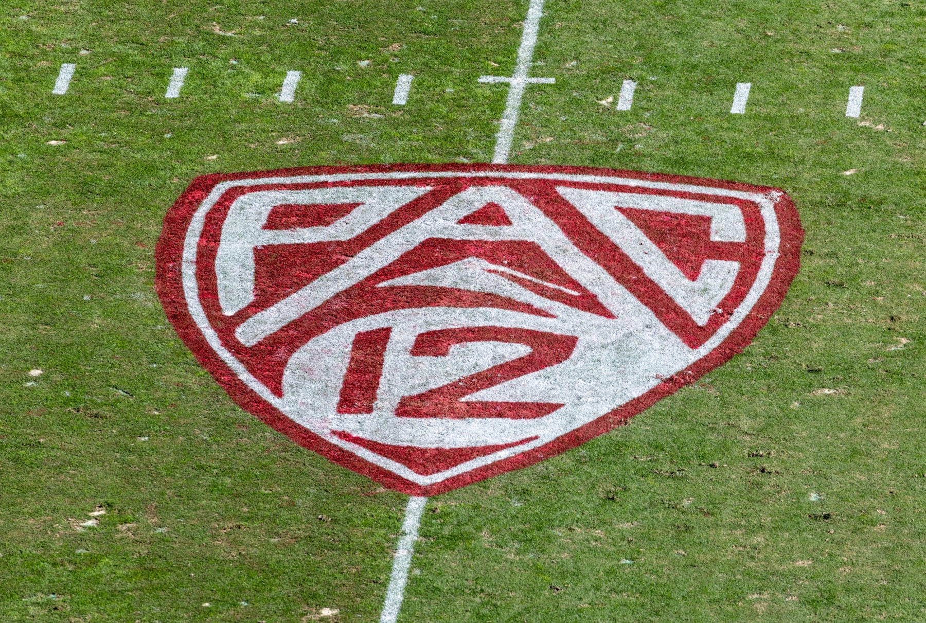 PALO ALTO, CA - OCTOBER 22:  A high angle view of the Pac-12 logo on the field at Stanford Stadium during an NCAA Pac-12 college football game between the Arizona State Sun Devils and the Stanford Cardinal on October 22, 2022 at Stanford Stadium in Palo Alto, California.  (Photo by David Madison/Getty Images)