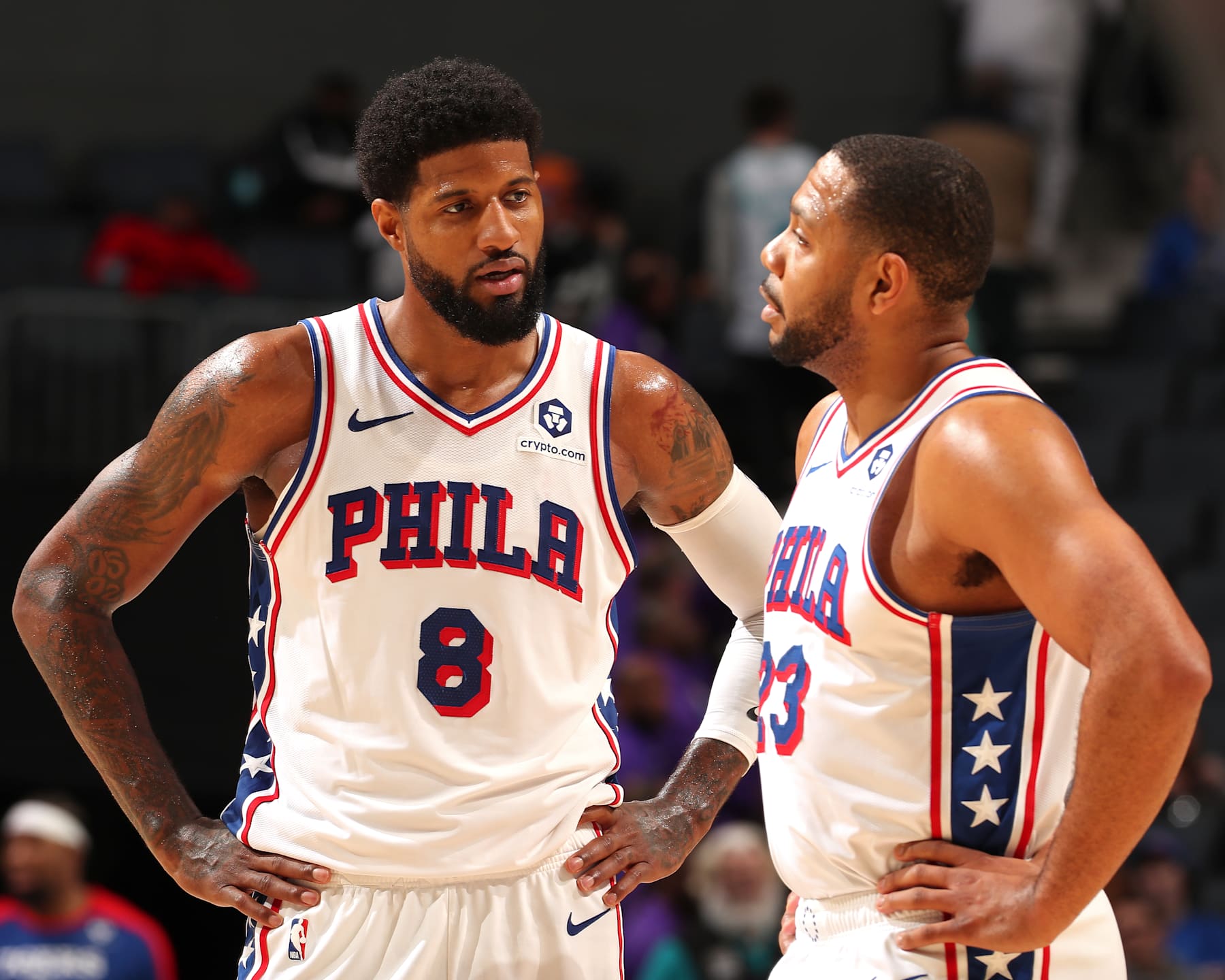 CHARLOTTE, NC - DECEMBER 16: Paul George #8 and Eric Gordon #23 of the Philadelphia 76ers look on during the game against the Charlotte Hornets on December 16, 2024 at Spectrum Center in Charlotte, North Carolina. NOTE TO USER: User expressly acknowledges and agrees that, by downloading and or using this photograph, User is consenting to the terms and conditions of the Getty Images License Agreement. Mandatory Copyright Notice: Copyright 2024 NBAE (Photo by Kent Smith/NBAE via Getty Images)