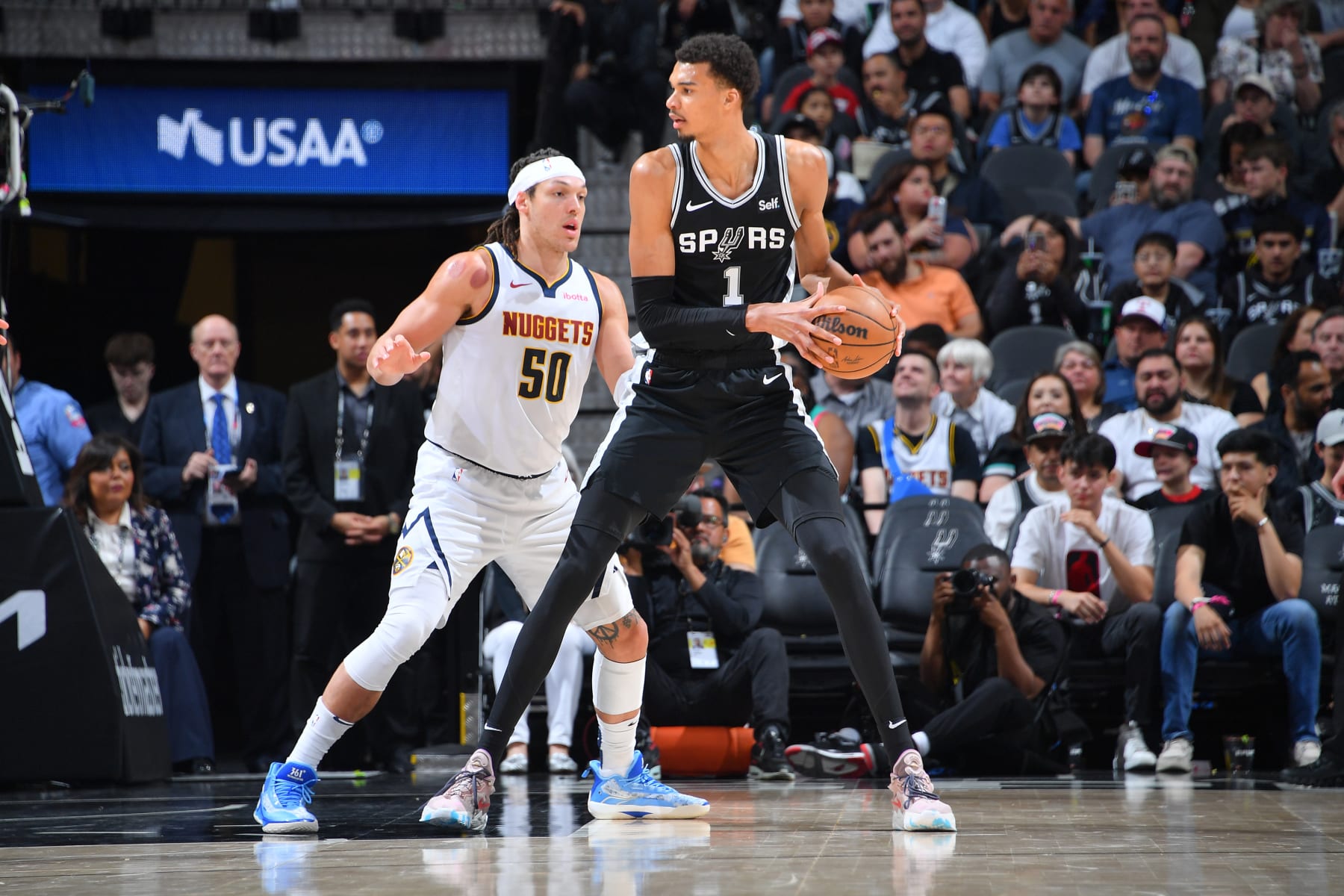 SAN ANTONIO, TX - APRIL 12:  Aaron Gordon #50 of the Denver Nuggets plays defense during the game  against Victor Wembanyama #1 of the San Antonio Spurs on April 12, 2024 at the Frost Bank Center in San Antonio, Texas. NOTE TO USER: User expressly acknowledges and agrees that, by downloading and or using this photograph, user is consenting to the terms and conditions of the Getty Images License Agreement. Mandatory Copyright Notice: Copyright 2024 NBAE (Photos by Michael Gonzales/NBAE via Getty Images)
