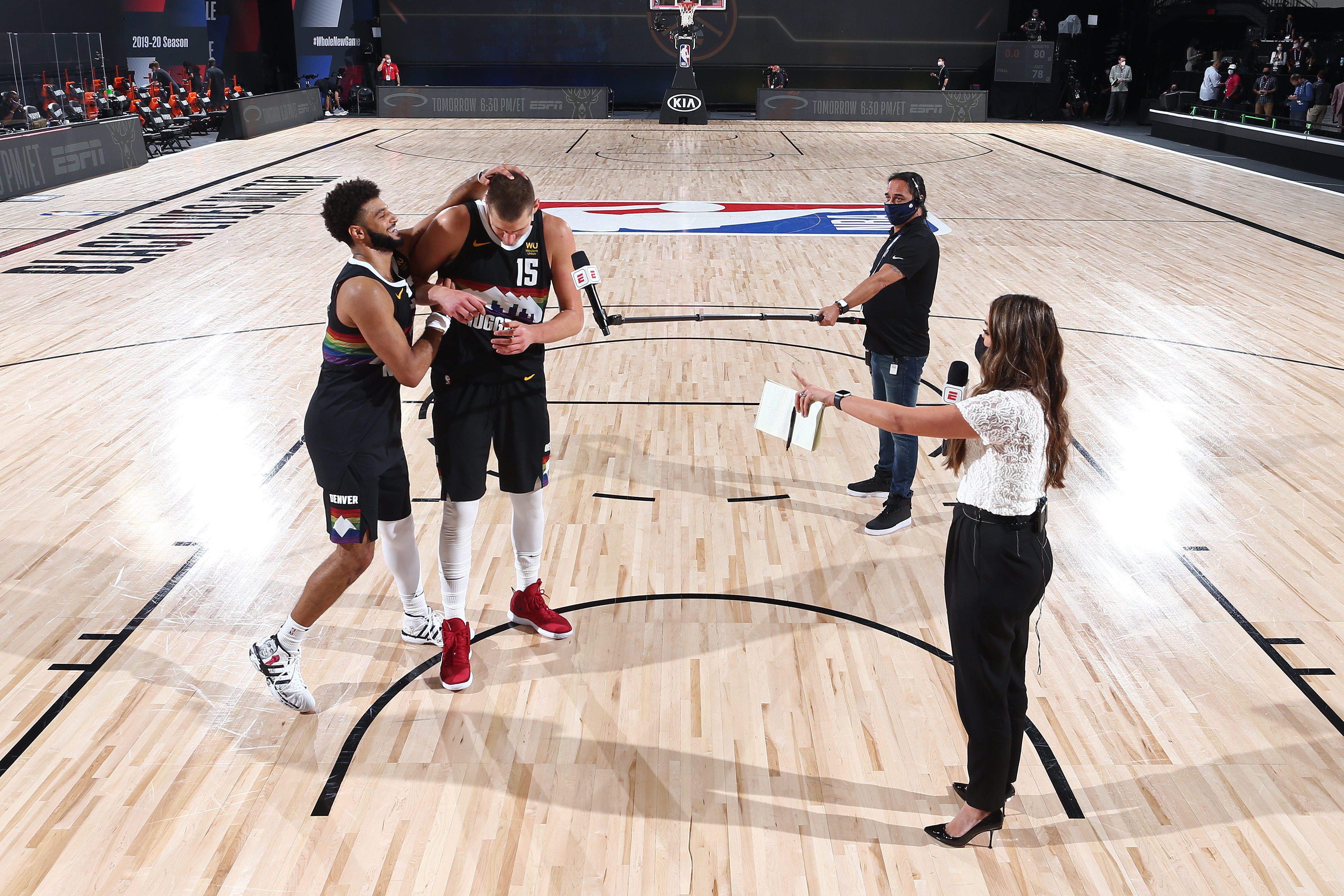 ORLANDO, FL - SEPTEMBER 1: Jamal Murray #27 joins Nikola Jokic #15 of the Denver Nuggets for an interview after a game against the Utah Jazz during Round One, Game Seven of the NBA Playoffs on September 1, 2020 at the AdventHealth Arena at ESPN Wide World Of Sports Complex in Orlando, Florida. NOTE TO USER: User expressly acknowledges and agrees that, by downloading and/or using this Photograph, user is consenting to the terms and conditions of the Getty Images License Agreement. Mandatory Copyright Notice: Copyright 2020 NBAE (Photo by Garrett Ellwood/NBAE via Getty Images)