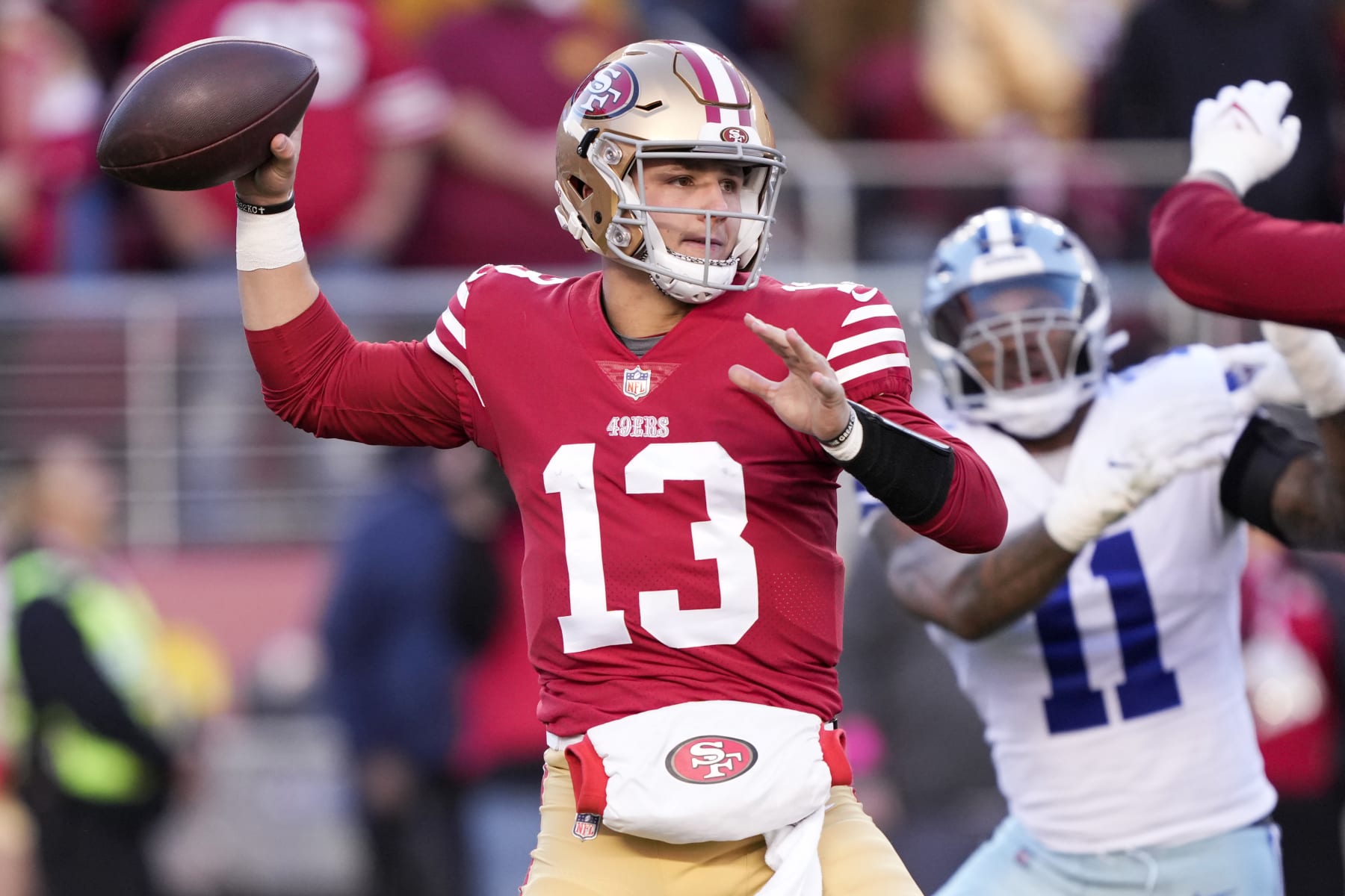 SANTA CLARA, CALIFORNIA - JANUARY 22: Brock Purdy #13 of the San Francisco 49ers throws a pass against the Dallas Cowboys during the first quarter in the NFC Divisional Playoff game at Levi's Stadium on January 22, 2023 in Santa Clara, California. (Photo by Thearon W. Henderson/Getty Images)