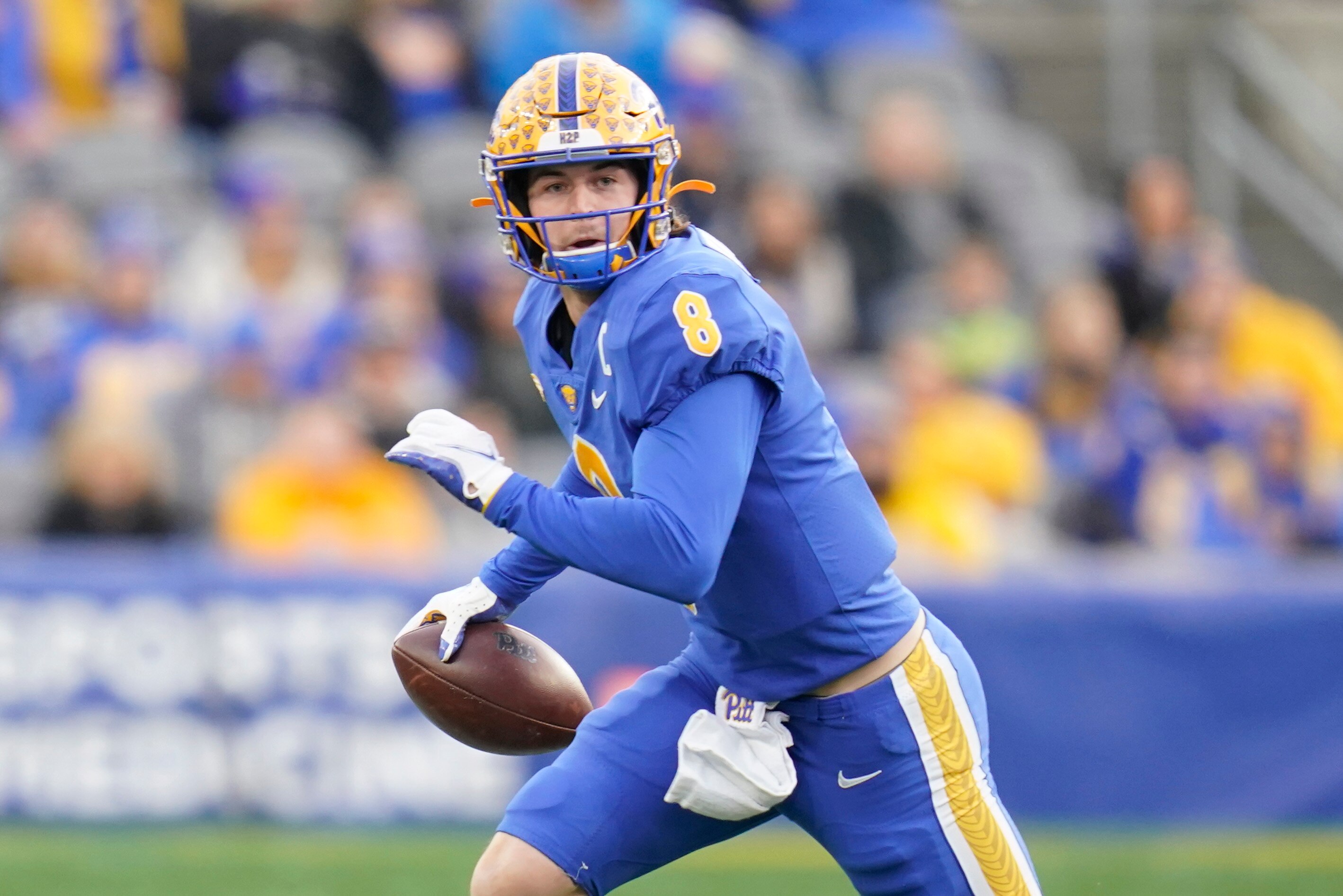 Pittsburgh quarterback Kenny Pickett (8) plays against Virginia during an NCAA college football game, Saturday, Nov. 20, 2021, in Pittsburgh. (AP Photo/Keith Srakocic)