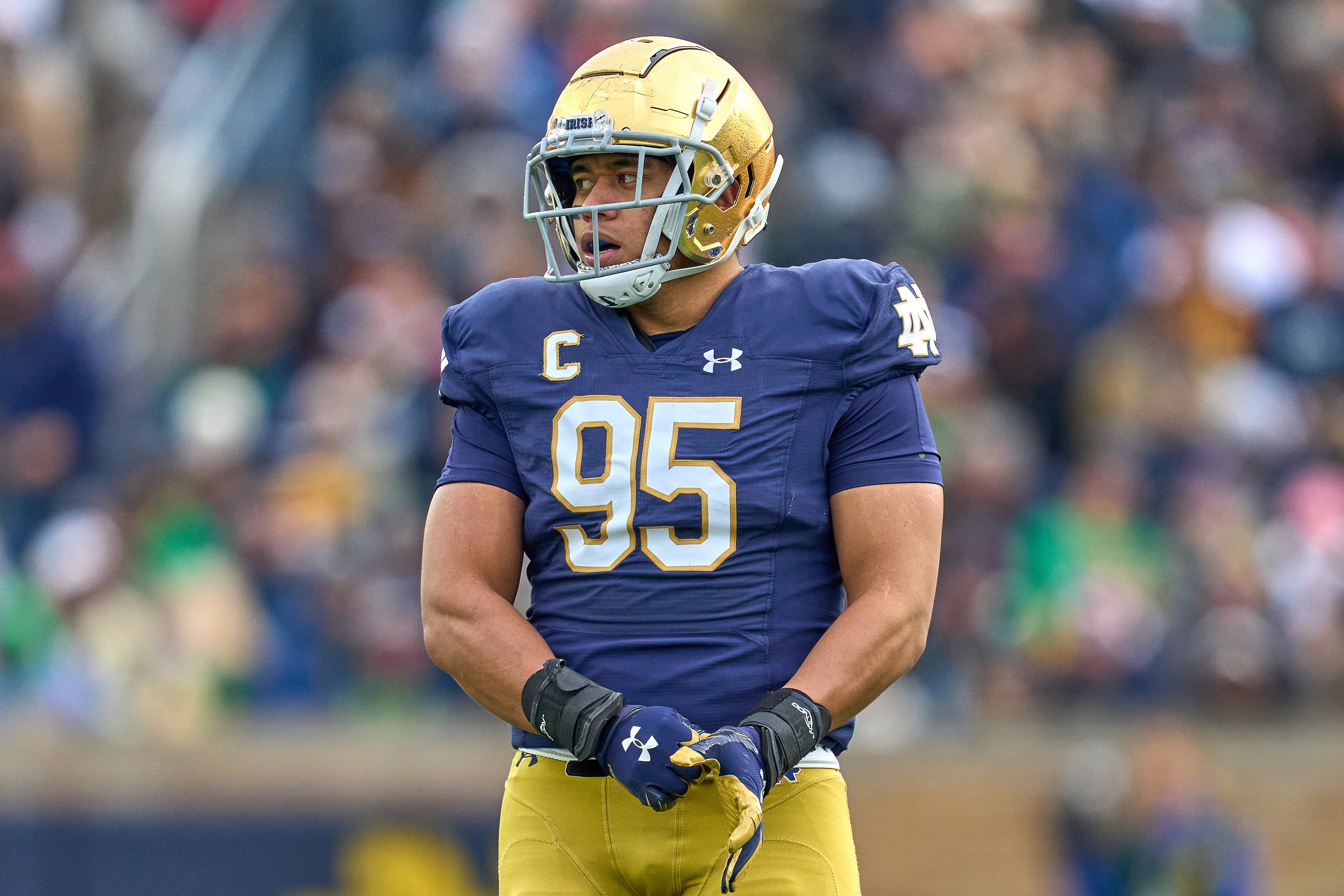 SOUTH BEND, IN - NOVEMBER 20: Notre Dame Fighting Irish defensive lineman Myron Tagovailoa-Amosa (95) looks on during a game between the Notre Dame Fighting Irish and the Georgia Tech Yellow Jackets on November 20, 2021 at Notre Dame Stadium, in South Bend, IN.  (Photo by Robin Alam/Icon Sportswire via Getty Images)