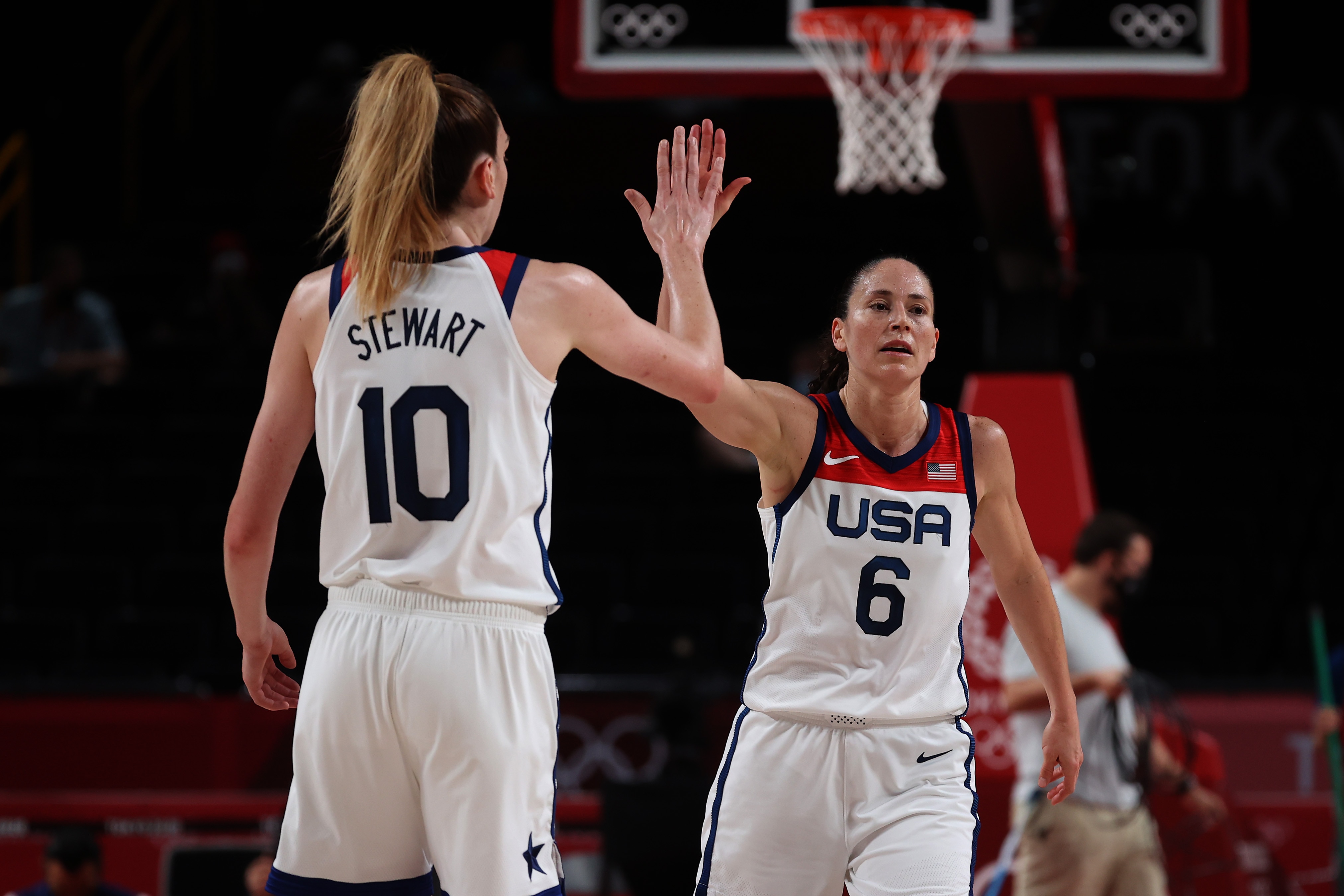 SAITAMA, JAPAN - AUGUST 08:  Breanna Stewart #10 and Sue Bird #6 of Team United States celebrate the play against Team Japan during the second half of the Women's Basketball final game on day sixteen of the 2020 Tokyo Olympic games at Saitama Super Arena on August 08, 2021 in Saitama, Japan. (Photo by Gregory Shamus/Getty Images)