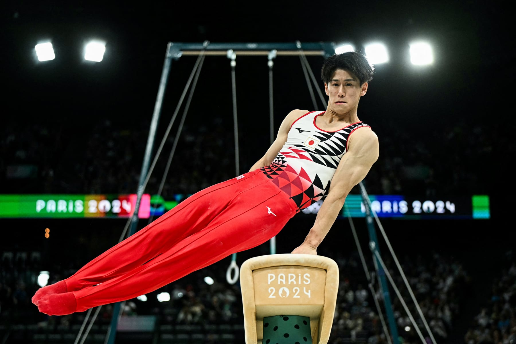 Japan's Daiki Hashimoto competes in the pommel horse event of the artistic gymnastics men's qualification during the Paris 2024 Olympic Games at the Bercy Arena in Paris, on July 27, 2024. (Photo by Gabriel BOUYS / AFP) (Photo by GABRIEL BOUYS/AFP via Getty Images)