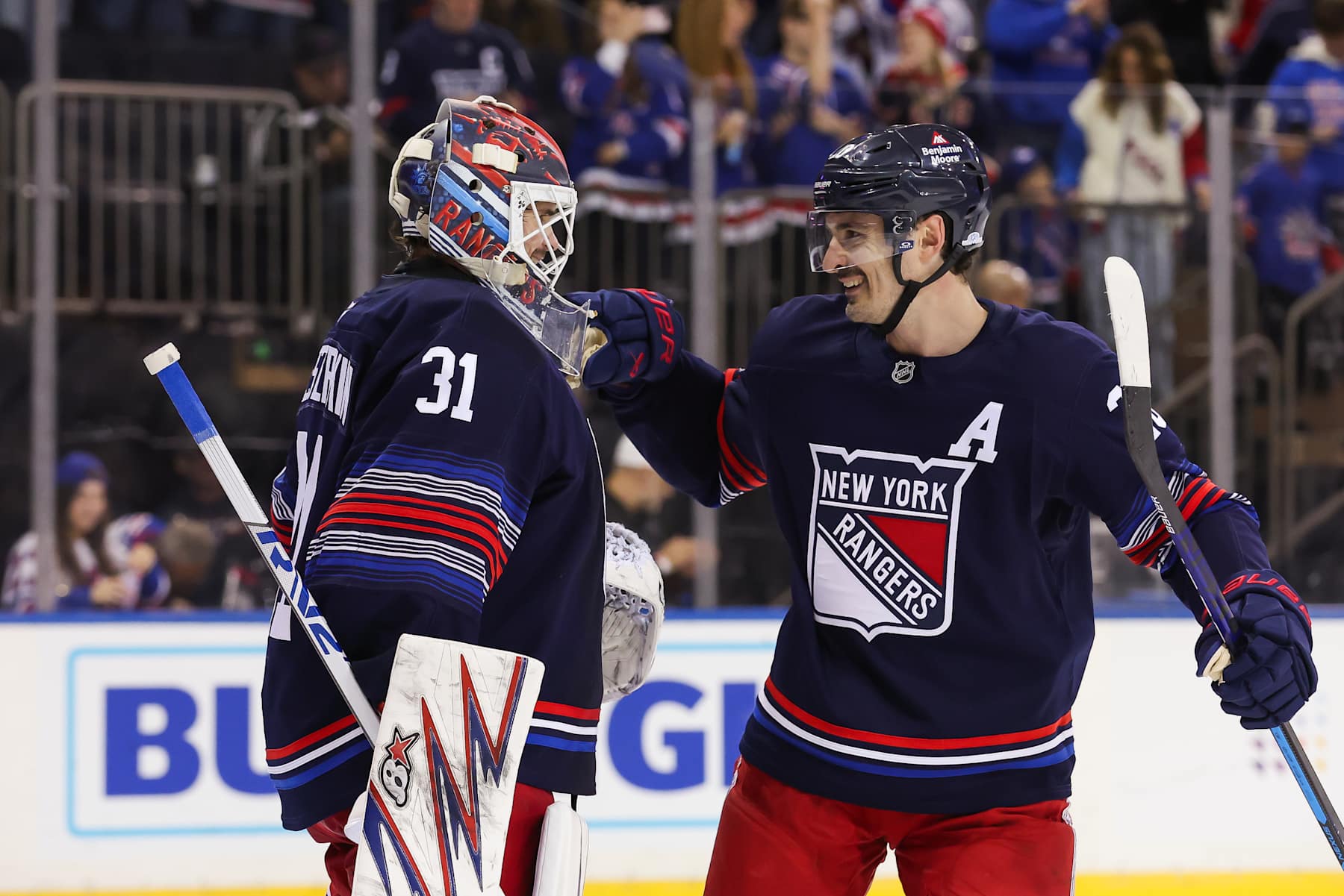 Igor Shesterkin and Chris Kreider.