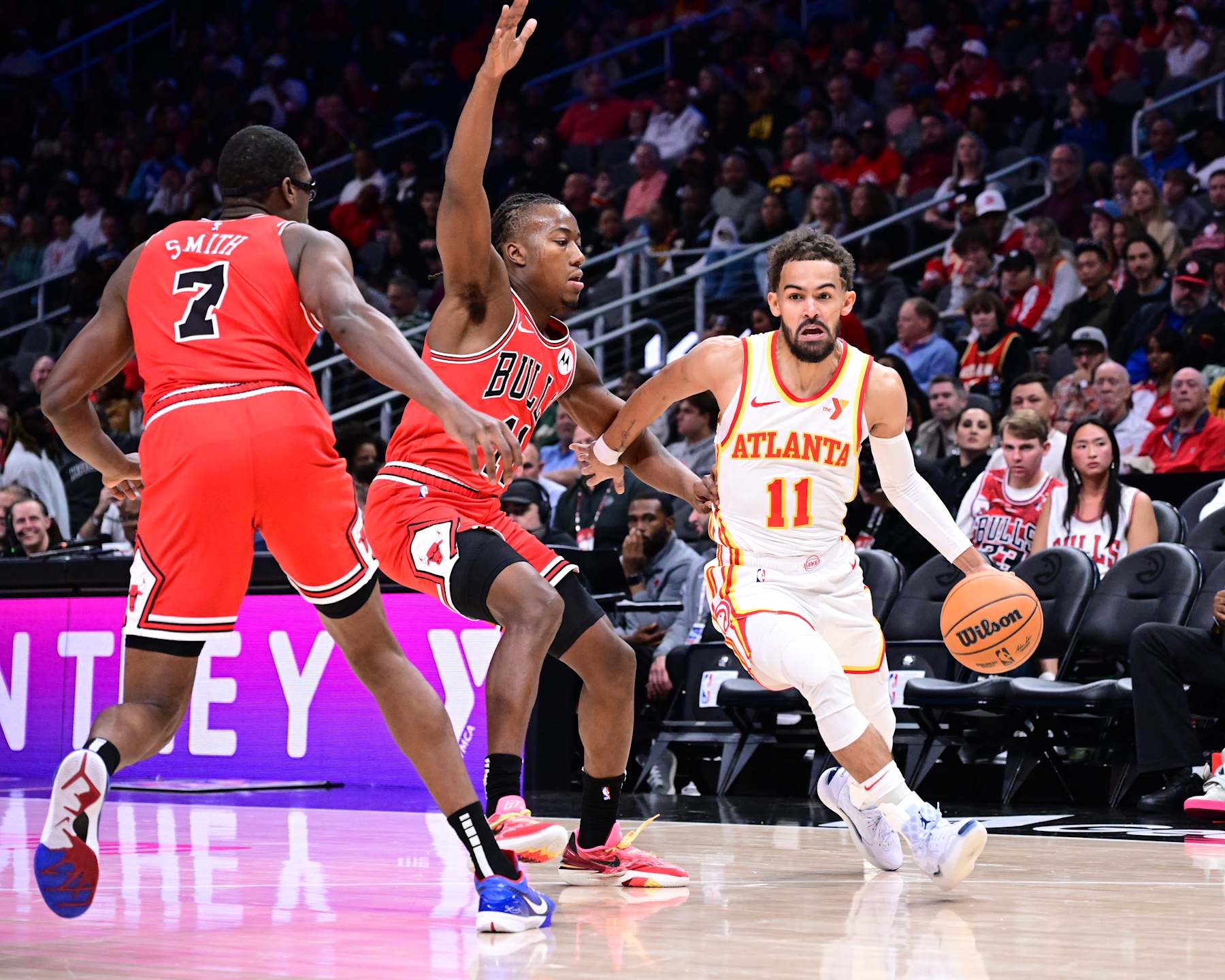 ATLANTA, GA - NOVEMBER 9: Trae Young #11 of the Atlanta Hawks dribbles the ball during the game against the Chicago Bulls on November 9, 2024 at State Farm Arena in Atlanta, Georgia.  NOTE TO USER: User expressly acknowledges and agrees that, by downloading and/or using this Photograph, user is consenting to the terms and conditions of the Getty Images License Agreement. Mandatory Copyright Notice: Copyright 2024 NBAE (Photo by Adam Hagy/NBAE via Getty Images)