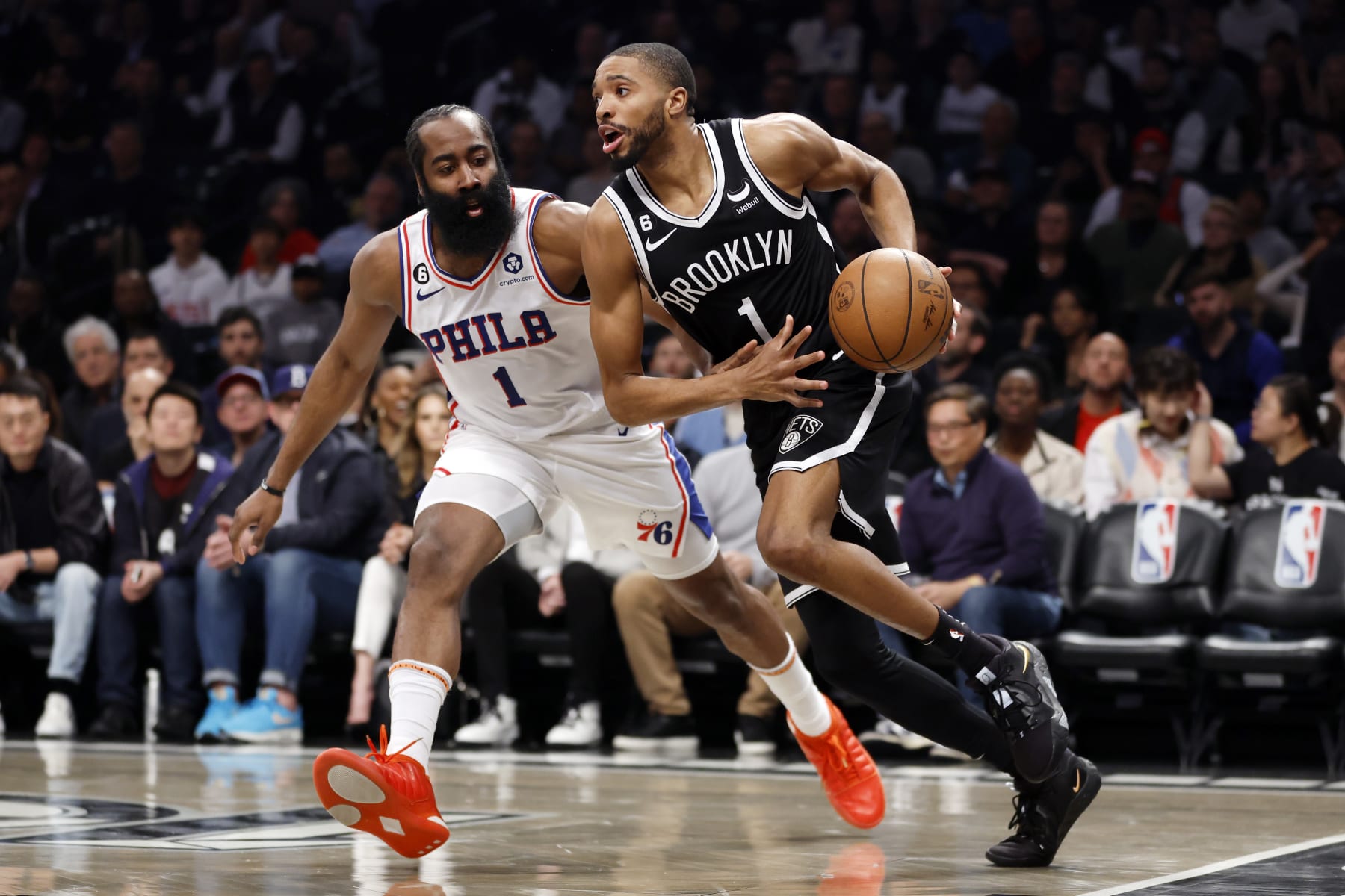 NEW YORK, NEW YORK - APRIL 20: Mikal Bridges #1 of the Brooklyn Nets dribbles against James Harden #1 of the Philadelphia 76ers during the first half of Game Three of the Eastern Conference First Round Playoffs at Barclays Center on April 20, 2023 in the Brooklyn borough of New York City. NOTE TO USER: User expressly acknowledges and agrees that, by downloading and or using this photograph, User is consenting to the terms and conditions of the Getty Images License Agreement. (Photo by Sarah Stier/Getty Images)