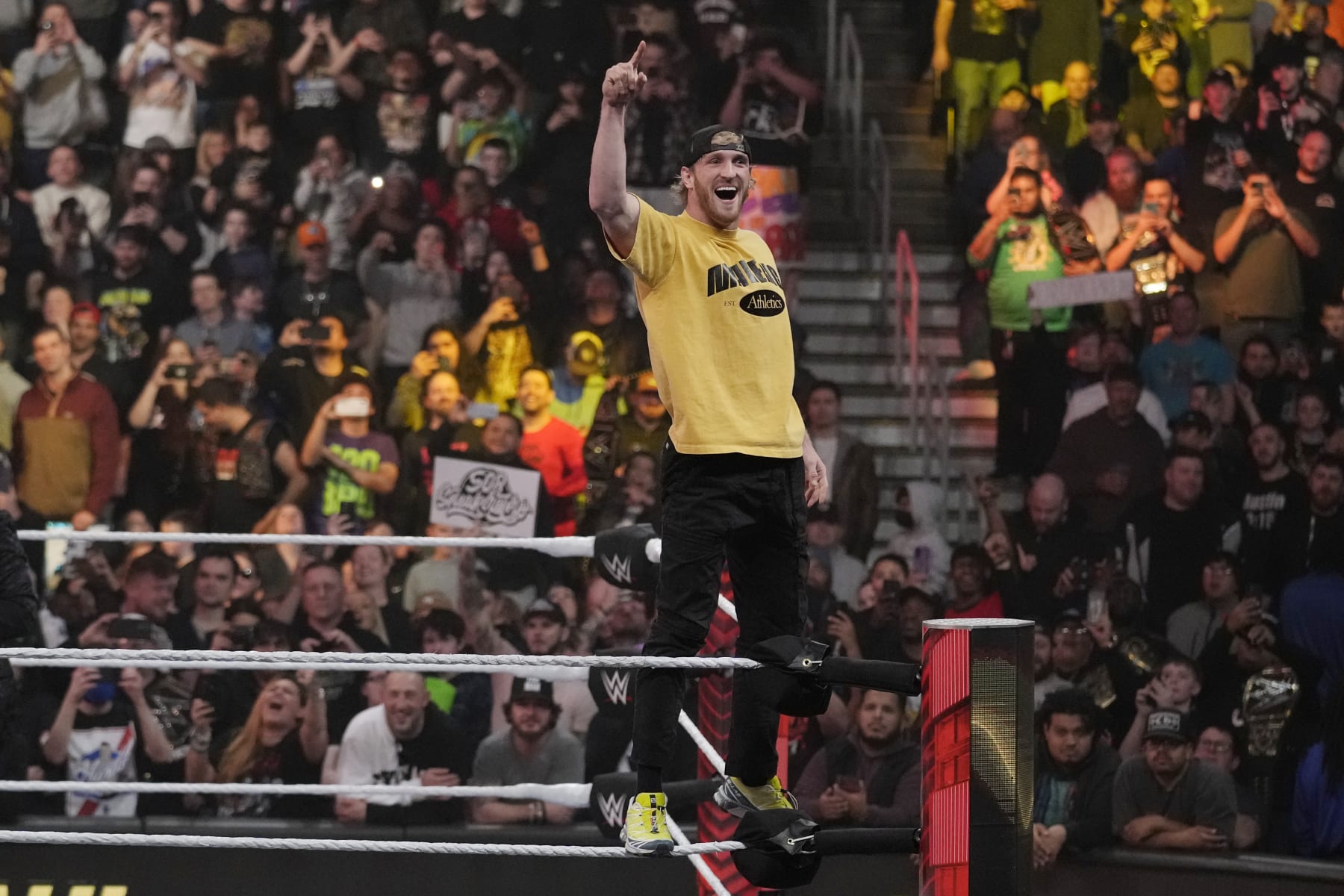 Fans cheer on wrestler Logan Paul during the WWE Monday Night RAW event, Monday, March 6, 2023, in Boston. (AP Photo/Charles Krupa)