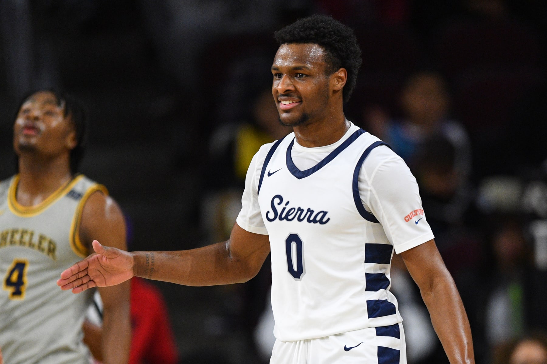 LOS ANGELES, CA - JANUARY 07: 	Sierra Canyon guard Bronny James celebrates during a high school basketball game between Sierra Canyon High School and Wheeler High School in The Chosen-1's Invitational at Galen Center on January 7, 2023 in Los Angeles, California. (Photo by Brian Rothmuller/Icon Sportswire via Getty Images).