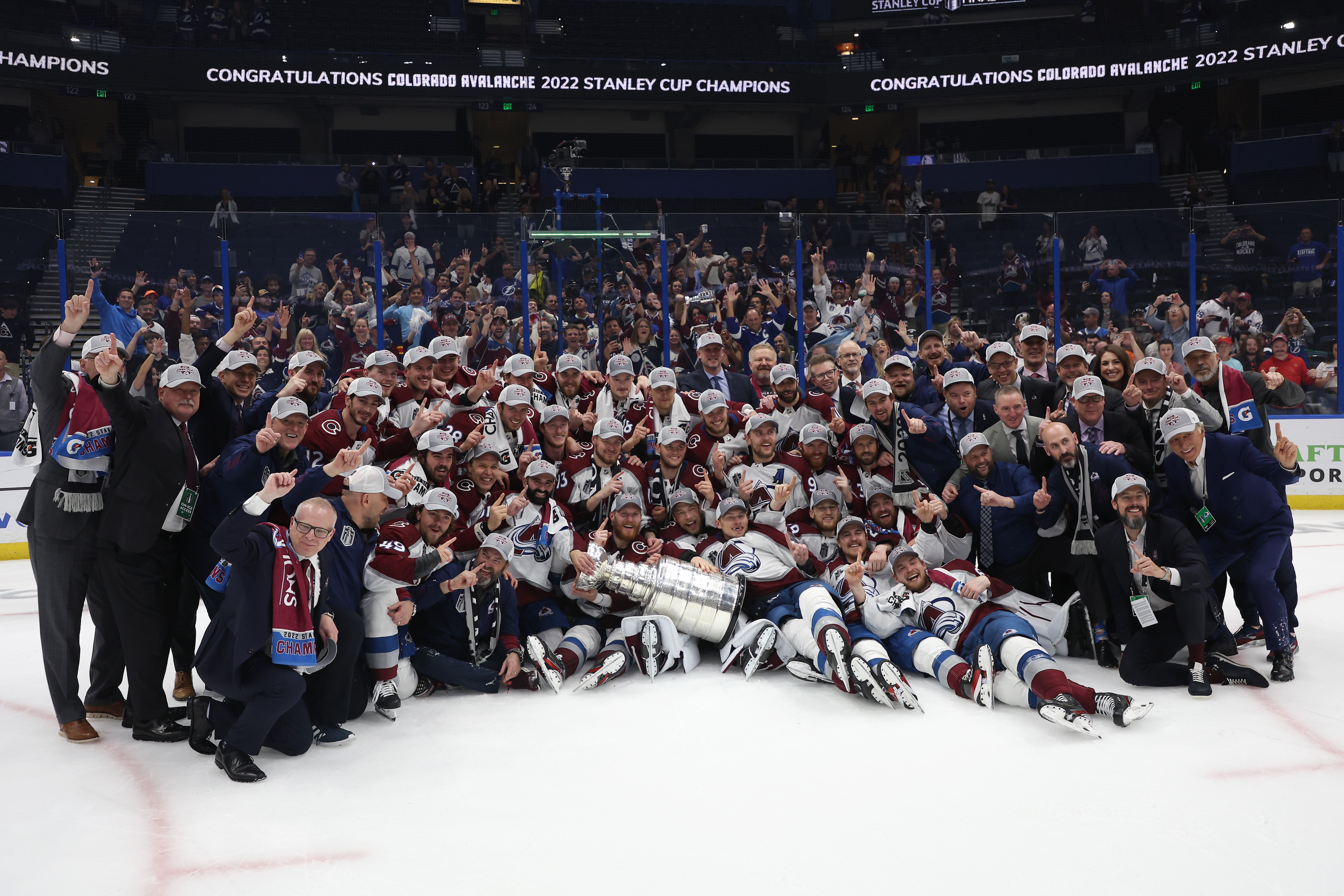 TAMPA, FLORIDA - JUNE 26: Colorado Avalanche coaches and players pose for a photo after defeating the Tampa Bay Lightning 2-1 in Game Six of the 2022 NHL Stanley Cup Final at Amalie Arena on June 26, 2022 in Tampa, Florida. (Photo by Christian Petersen/Getty Images)