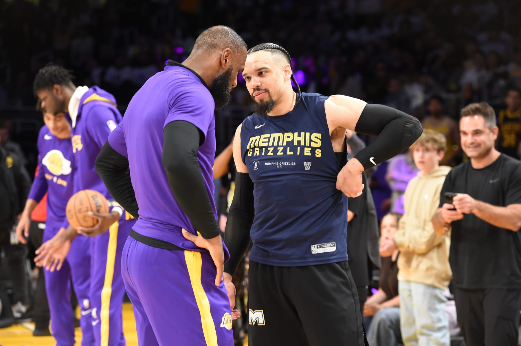 LOS ANGELES, CA - APRIL 22: LeBron James #6 of the Los Angeles Lakers talks with Dillon Brooks #24 of the Memphis Grizzlies prior to Round 1 Game 3 of the 2023 NBA Playoffs on APRIL 22, 2023 at Crypto.Com Arena in Los Angeles, California. NOTE TO USER: User expressly acknowledges and agrees that, by downloading and/or using this Photograph, user is consenting to the terms and conditions of the Getty Images License Agreement. Mandatory Copyright Notice: Copyright 2023 NBAE (Photo by Andrew D. Bernstein/NBAE via Getty Images)