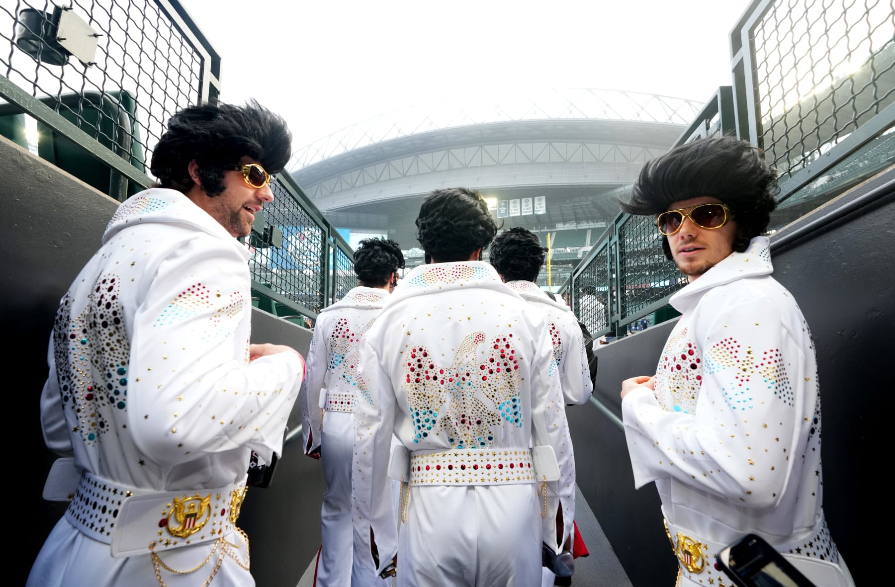 SEATTLE, WASHINGTON - JANUARY 01: (L-R) Nicolas Hague #14 and Brett Howden #21 and their Vegas Golden Knights teammates arrive dressed as Elvis before the 2024 Discover NHL Winter Classic between the Vegas Golden Knights and the Seattle Kraken at T-Mobile Park on January 01, 2024 in Seattle, Washington. (Photo by Jeff Bottari/NHLI via Getty Images) SEATTLE, WASHINGTON - JANUARY 01: (L-R) Nicolas Hague #14 and Brett Howden #21 and their Vegas Golden Knights teammates arrive dressed as Elvis before the 2024 Discover NHL Winter Classic between the Vegas Golden Knights and the Seattle Kraken at T-Mobile Park on January 01, 2024 in Seattle, Washington. (Photo by Jeff Bottari/NHLI via Getty Images)