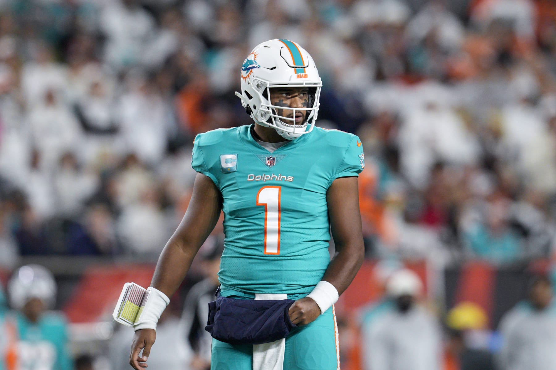 Miami Dolphins quarterback Tua Tagovailoa (1) plays during an NFL football game against the Cincinnati Bengals, Friday, Sept. 30, 2022, in Cincinnati. (AP Photo/Jeff Dean)