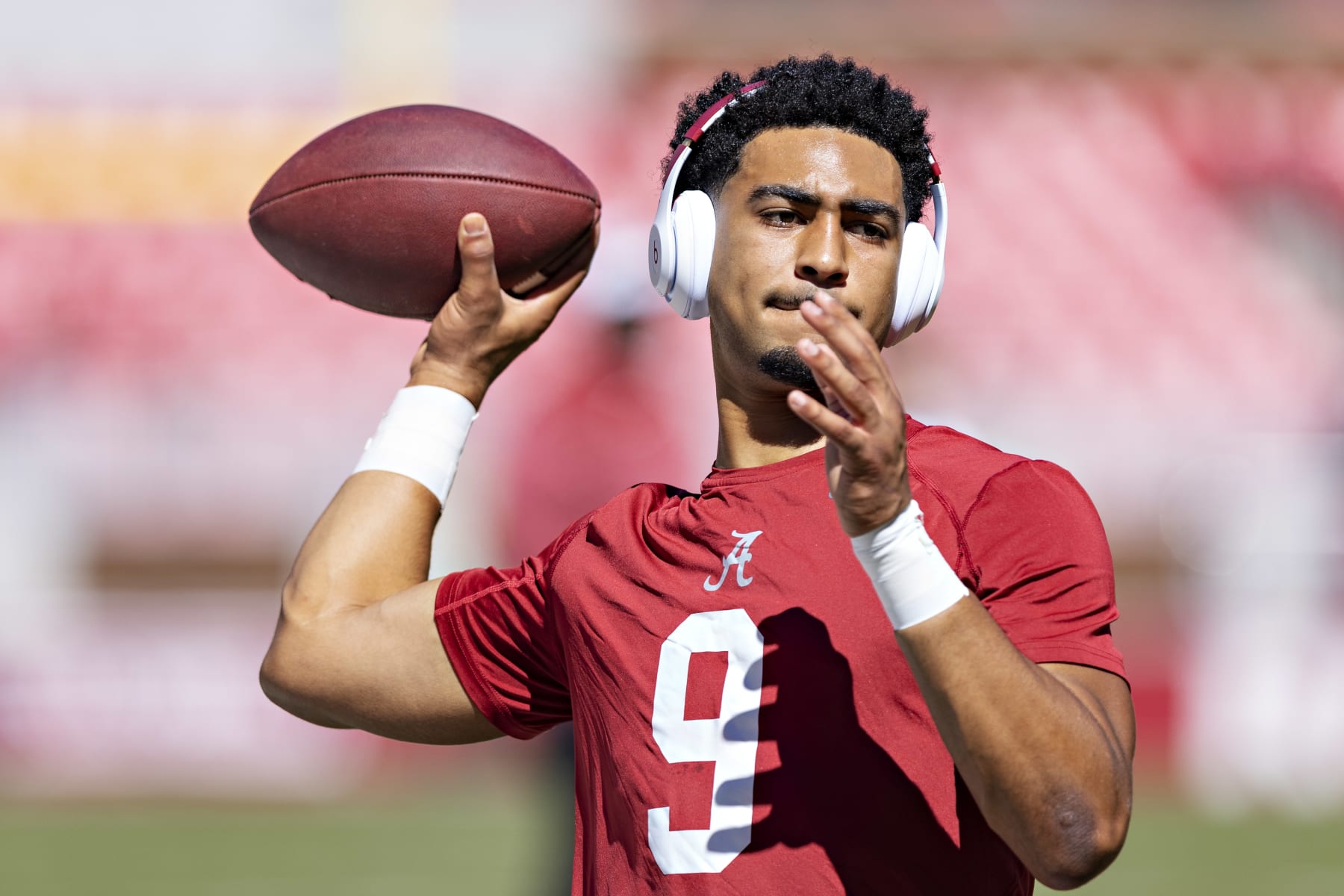 FAYETTEVILLE, ARKANSAS - OCTOBER 1: Bryce Young #9 of the Alabama Crimson Tide warms up before a game against the Arkansas Razorbacks at Donald W. Reynolds Razorback Stadium on October 1, 2022 in Fayetteville, Arkansas. The Crimson Tide defeated the Razorbacks 49-26. (Photo by Wesley Hitt/Getty Images)