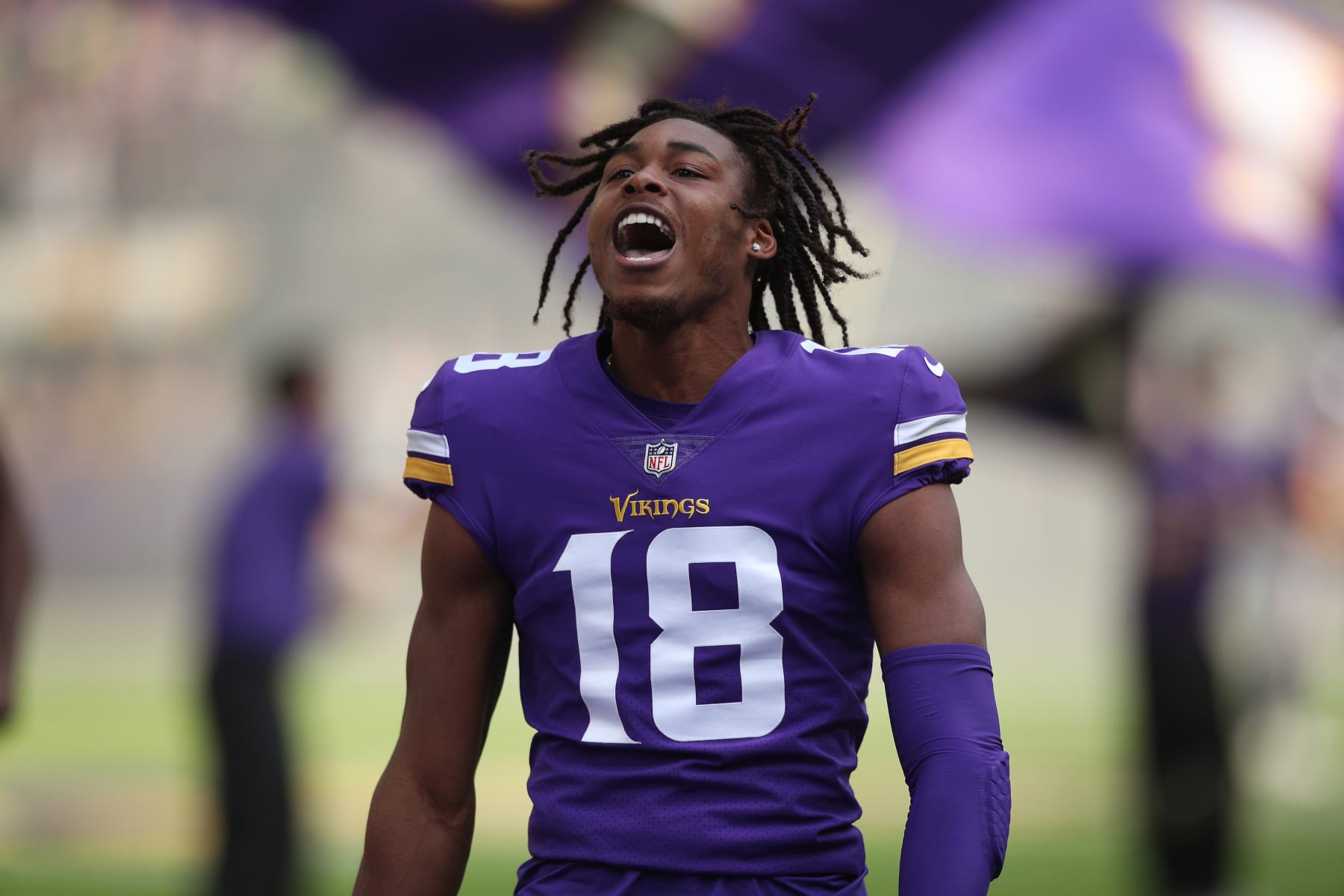 MINNEAPOLIS, MINNESOTA - SEPTEMBER 26: Justin Jefferson #18 of the Minnesota Vikings during player introductions before the game against the Seattle Seahawks at U.S. Bank Stadium on September 26, 2021 in Minneapolis, Minnesota. (Photo by David Berding/Getty Images)