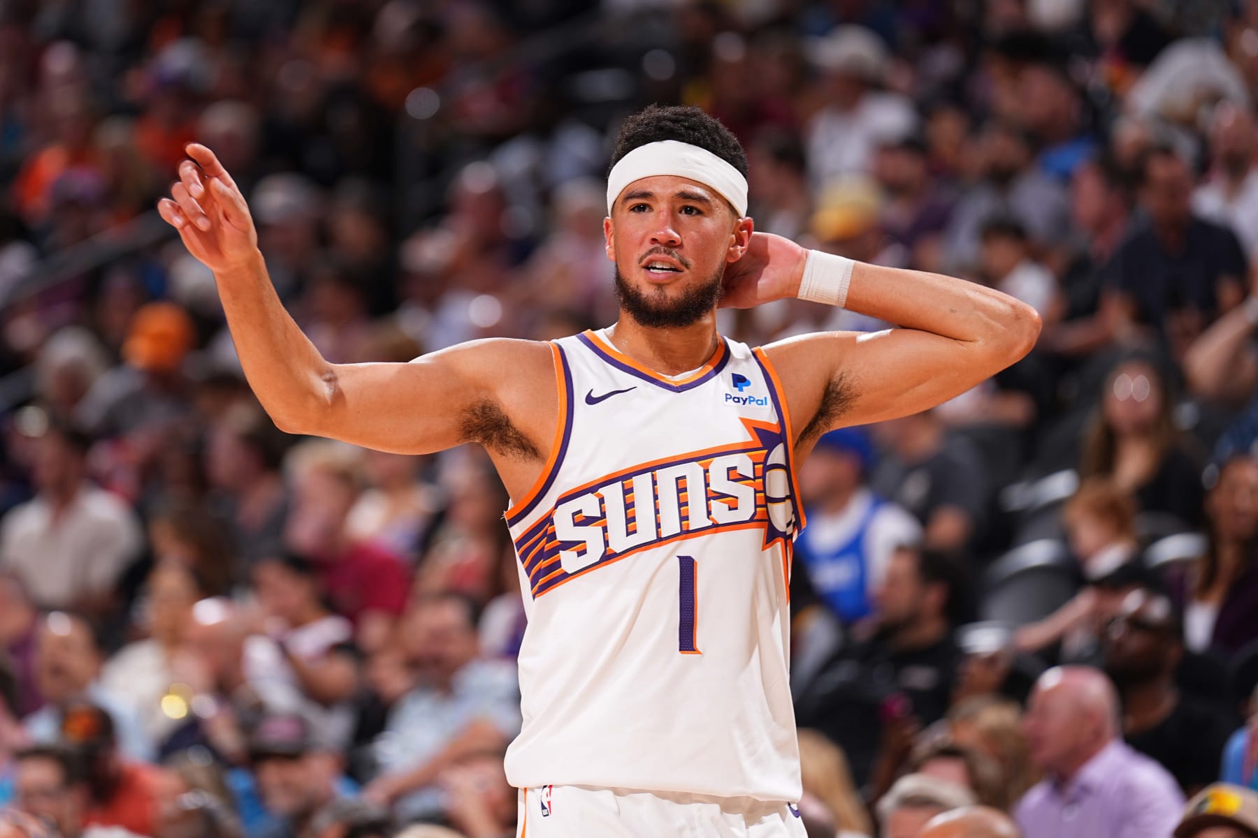 PHOENIX, AZ - OCTOBER 16: Devin Booker #1 of the Phoenix Suns looks on during the game against the Portland Trail Blazers on October 16, 2023 at Footprint Center in Phoenix, Arizona. NOTE TO USER: User expressly acknowledges and agrees that, by downloading and or using this photograph, user is consenting to the terms and conditions of the Getty Images License Agreement. Mandatory Copyright Notice: Copyright 2023 NBAE (Photo by Garrett Ellwood/NBAE via Getty Images)