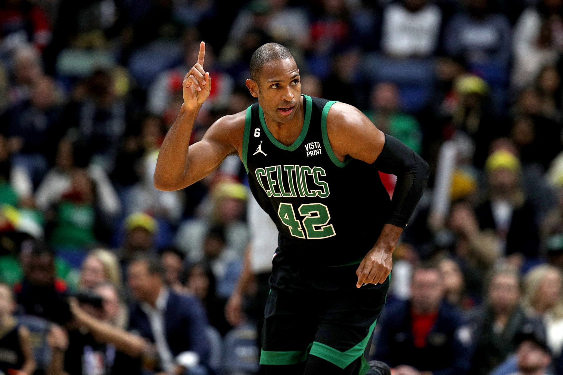 NEW ORLEANS, LOUISIANA - NOVEMBER 18: Al Horford #42 of the Boston Celtics reats after scoring a three point basket during the first quarter of an NBA game against the New Orleans Pelicans at Smoothie King Center on November 18, 2022 in New Orleans, Louisiana. NOTE TO USER: User expressly acknowledges and agrees that, by downloading and or using this photograph, User is consenting to the terms and conditions of the Getty Images License Agreement. (Photo by Sean Gardner/Getty Images)