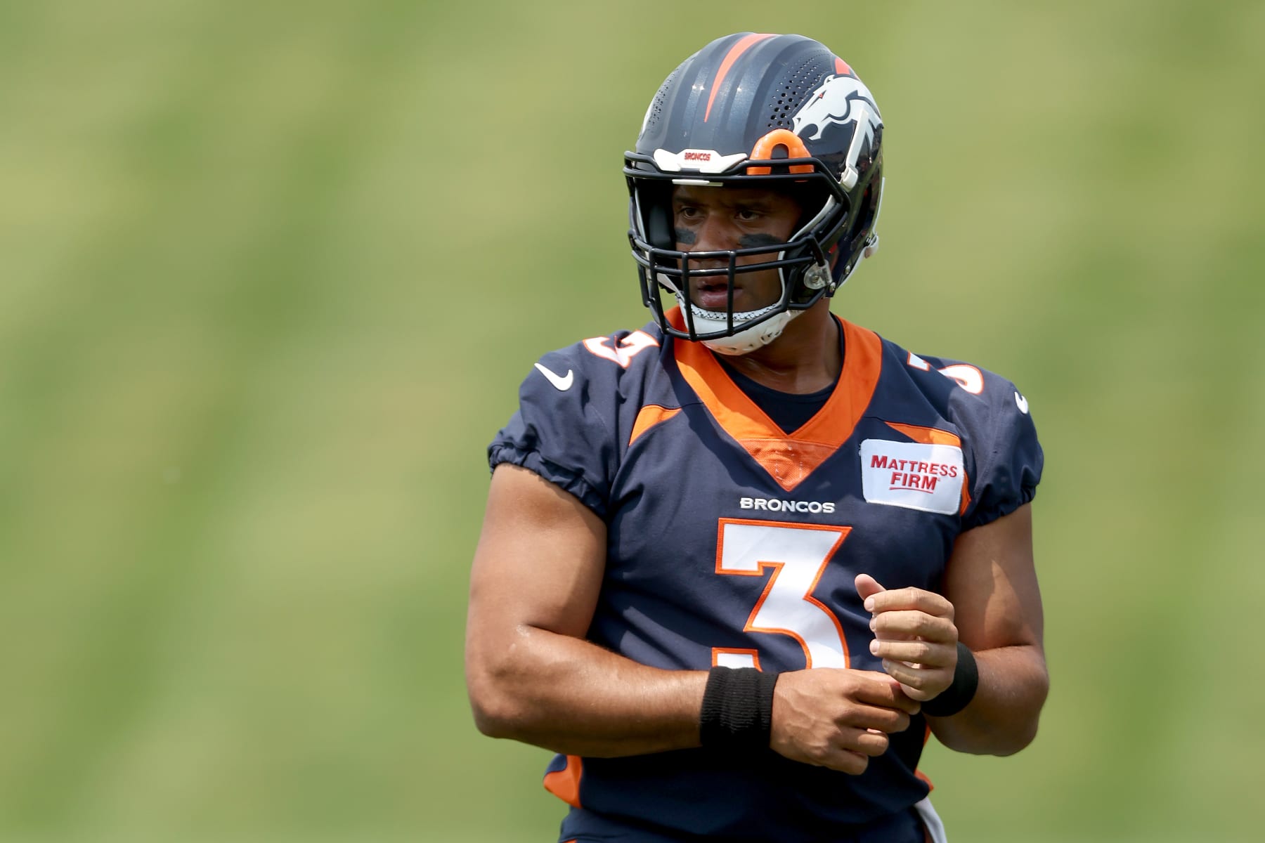ENGLEWOOD, COLORADO - JUNE 13: Quarterback Russell Wilson #3 of the Denver Broncos attends their mandatory mini-camp at UCHealth Training Center on June 13, 2022 in Englewood, Colorado. (Photo by Matthew Stockman/Getty Images)