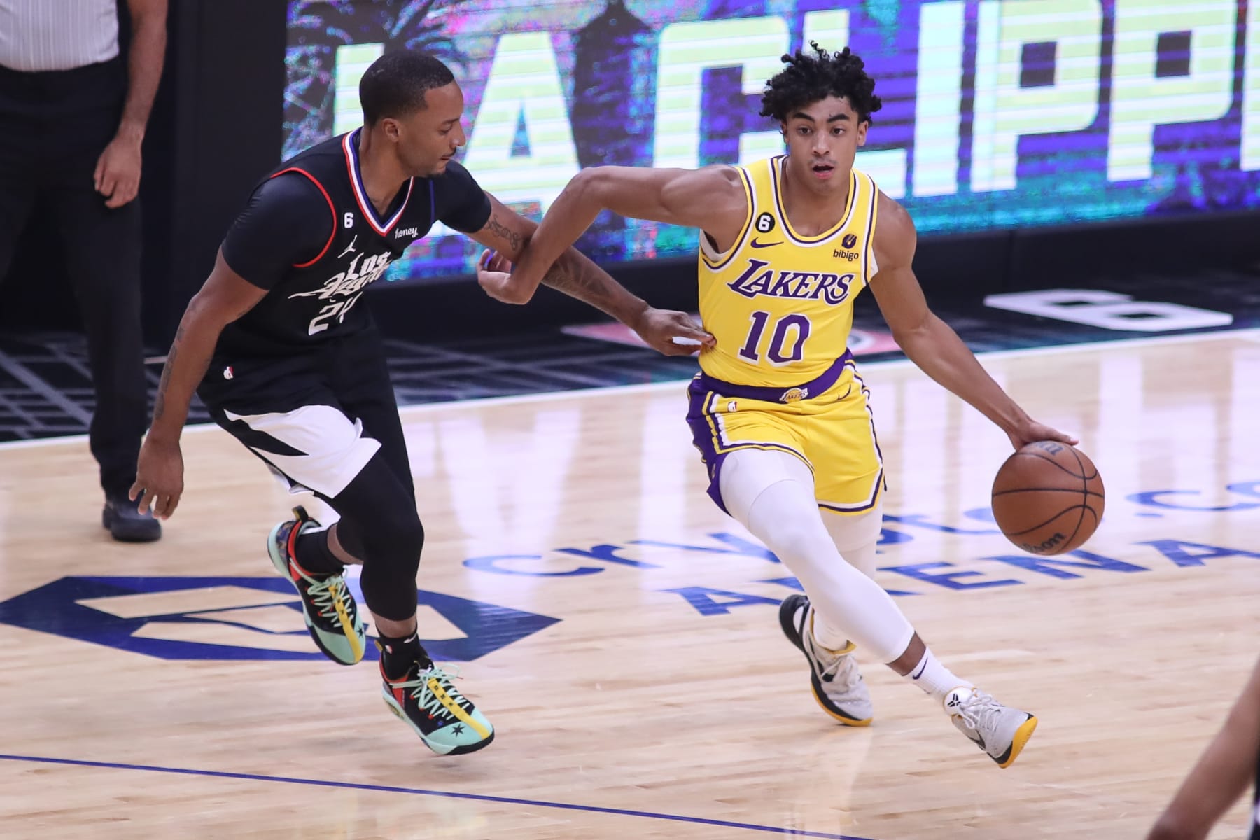 LOS ANGELES, CA - NOVEMBER 09: Los Angeles Lakers guard Max Christie (10) gets past LA Clippers forward Norman Powell (24) during the NBA game between the Los Angeles Lakers and the Los Angeles Clippers on November 09, 2022, at Crypto.com Arena in Los Angeles, CA. (Photo by Jevone Moore/Icon Sportswire via Getty Images)