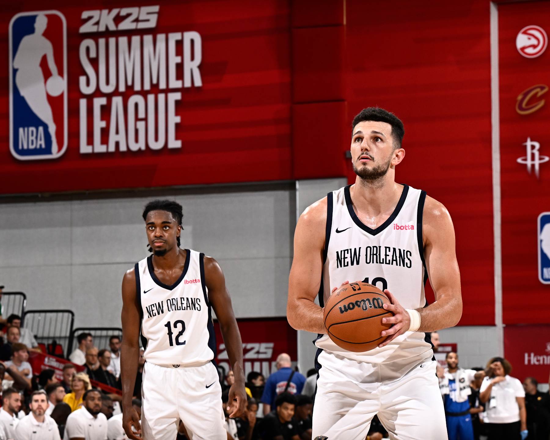 LAS VEGAS, NV - JULY 14:  Karlo Matkovic #13 of the New Orleans Pelicans shoots a free throw during the game  on July 14, 2024 at the Pavilion in Las Vegas, Nevada. NOTE TO USER: User expressly acknowledges and agrees that, by downloading and or using this photograph, User is consenting to the terms and conditions of the Getty Images License Agreement. Mandatory Copyright Notice: Copyright 2024 NBAE (Photo by David Dow/NBAE via Getty Images)