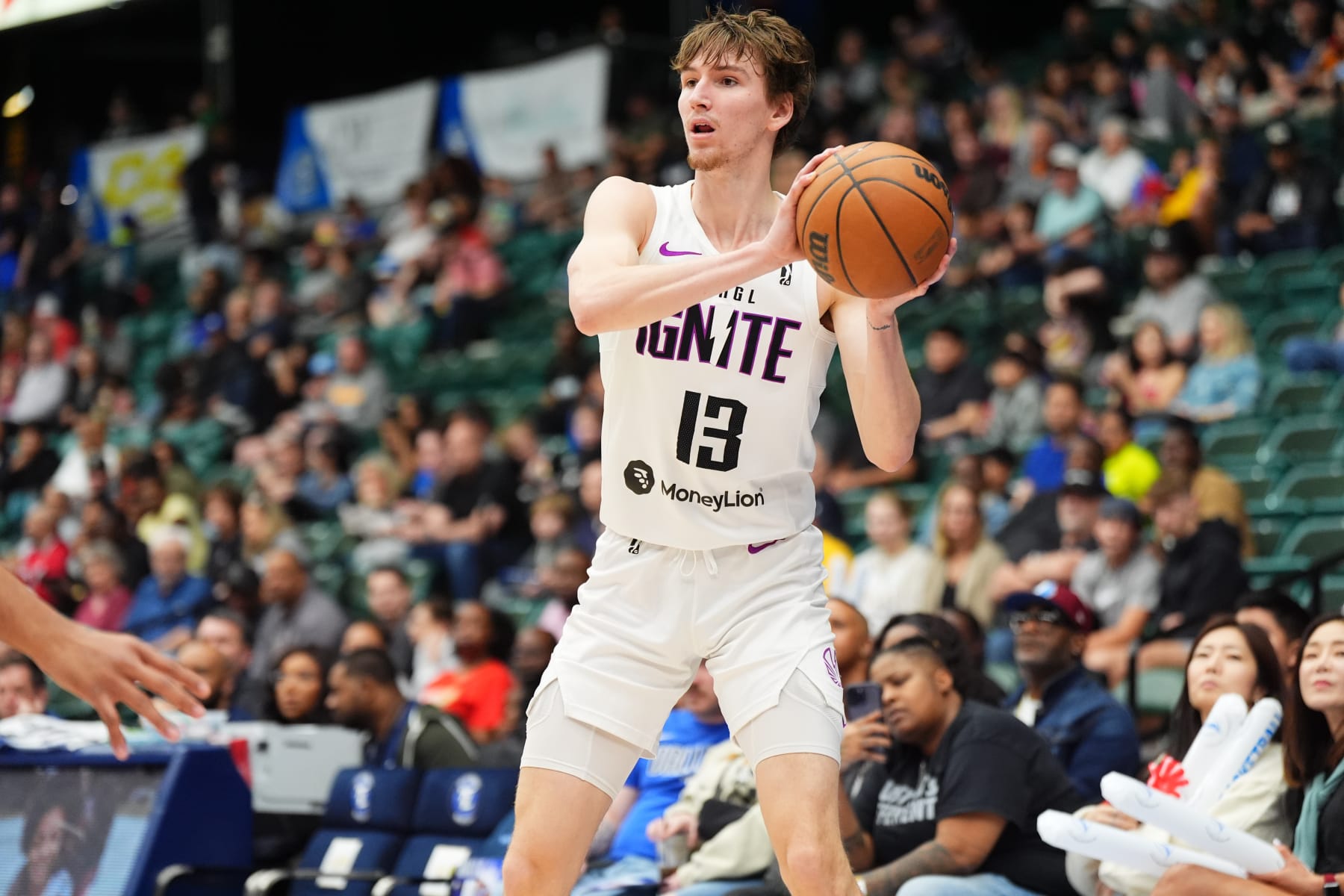 FRISCO, TX - FEBRUARY 27: Matas Buzelis #13 of the G League Ignite looks to pass the ball during the game against the Texas Legends on February 27, 2024 at Comerica Center in Frisco, Texas. NOTE TO USER: User expressly acknowledges and agrees that, by downloading and or using this photograph, User is consenting to the terms and conditions of the Getty Images License Agreement. Mandatory Copyright Notice: Copyright 2023 NBAE (Photo by Cooper Neill/NBAE via Getty Images)