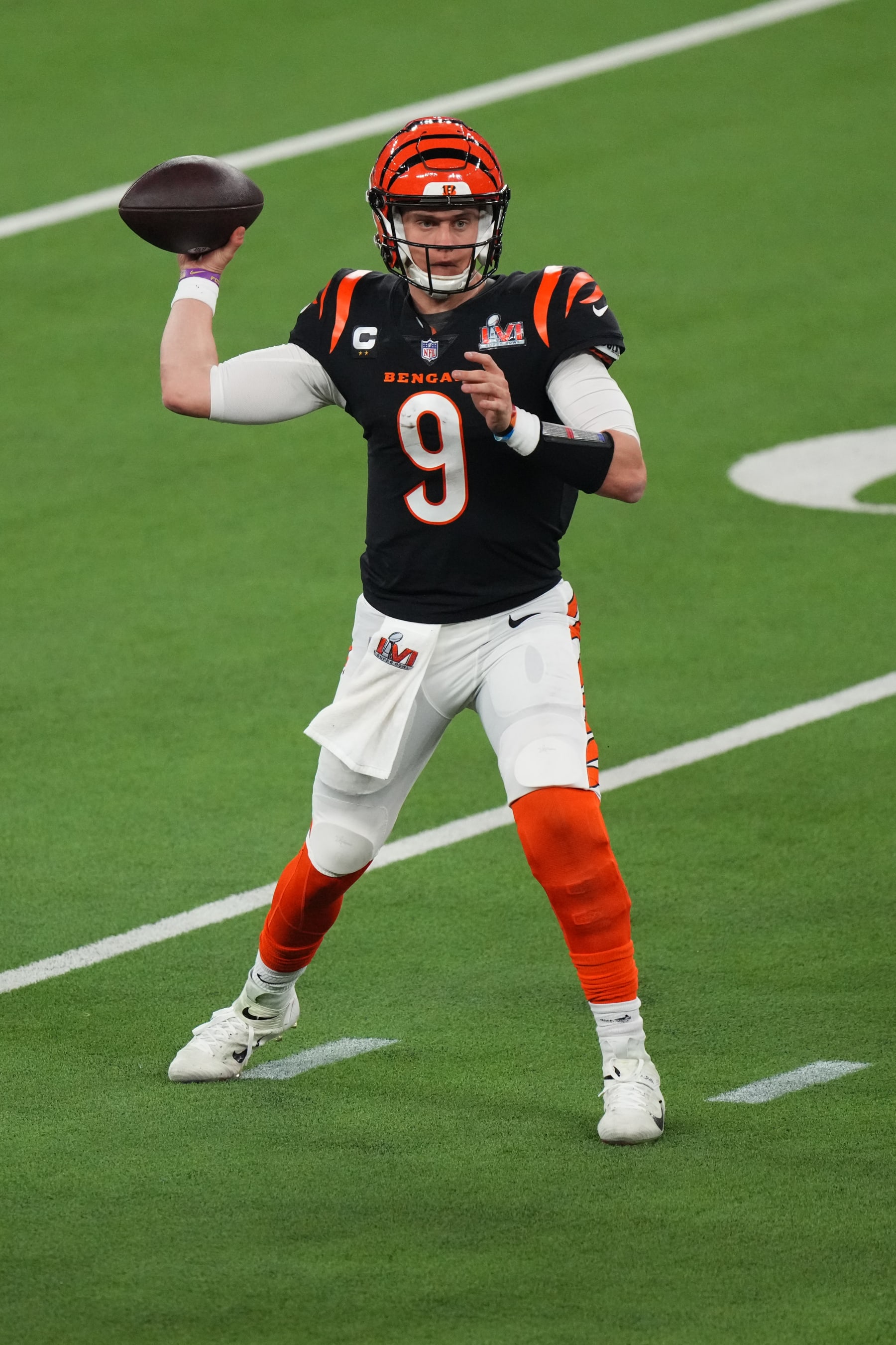 INGLEWOOD, CALIFORNIA - FEBRUARY 13: Joe Burrow #9 of the Cincinnati Bengals throws the ball during to the NFL Super Bowl LVI football game against the Los Angeles Rams at SoFi Stadium on February 13, 2022 in Inglewood, California. (Photo by Cooper Neill/Getty Images)