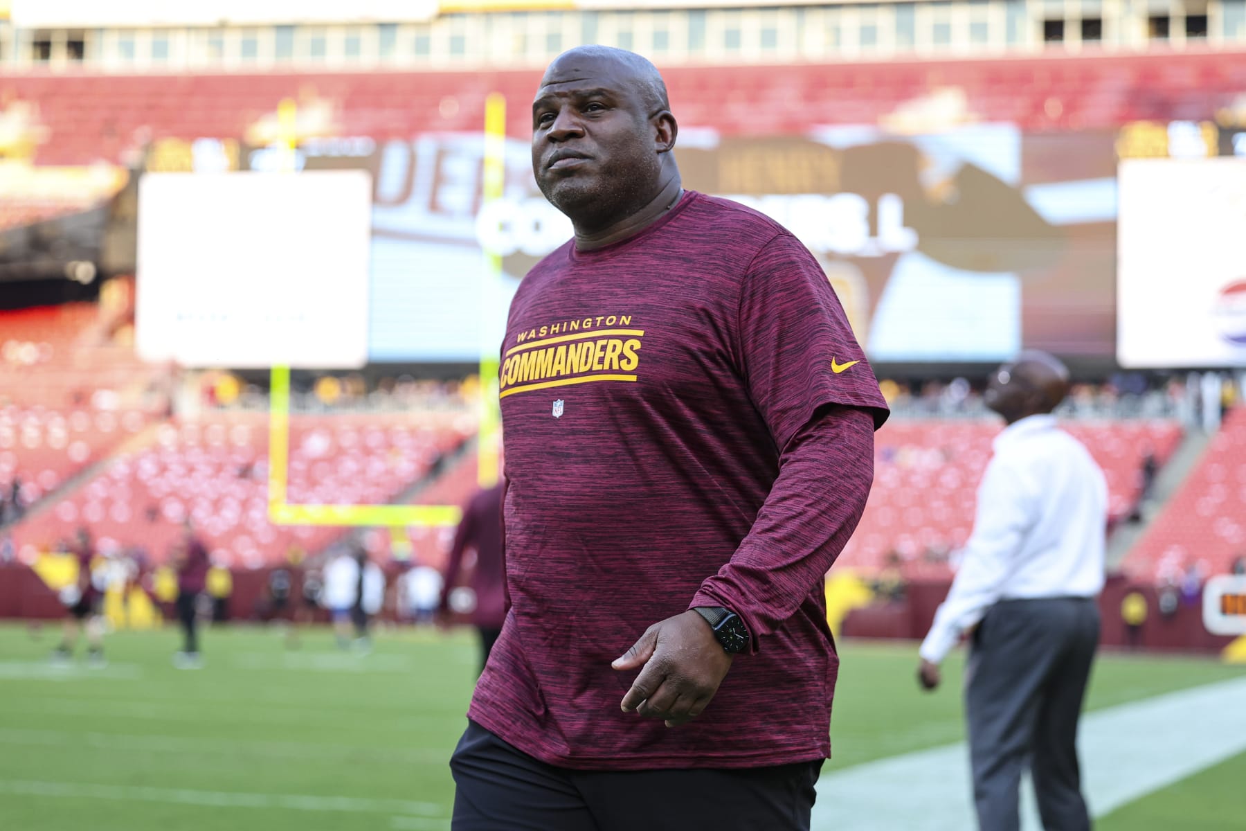 LANDOVER, MARYLAND - AUGUST 21: Eric Bieniemy of the Washington Commanders looks on against the Baltimore Ravens prior to the game  at FedEx Field on Monday, August 21, 2023, in Landover, Maryland. (Perry Knotts/Getty Images)