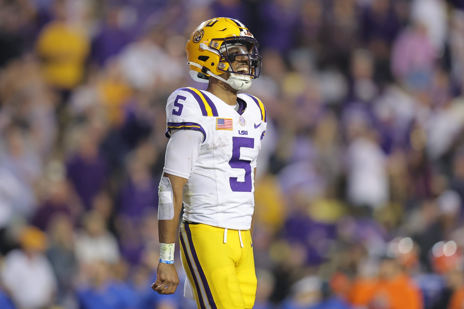 BATON ROUGE, LOUISIANA - NOVEMBER 11: Jayden Daniels #5 of the LSU Tigers reacts against the Florida Gators during a game at Tiger Stadium on November 11, 2023 in Baton Rouge, Louisiana. (Photo by Jonathan Bachman/Getty Images)