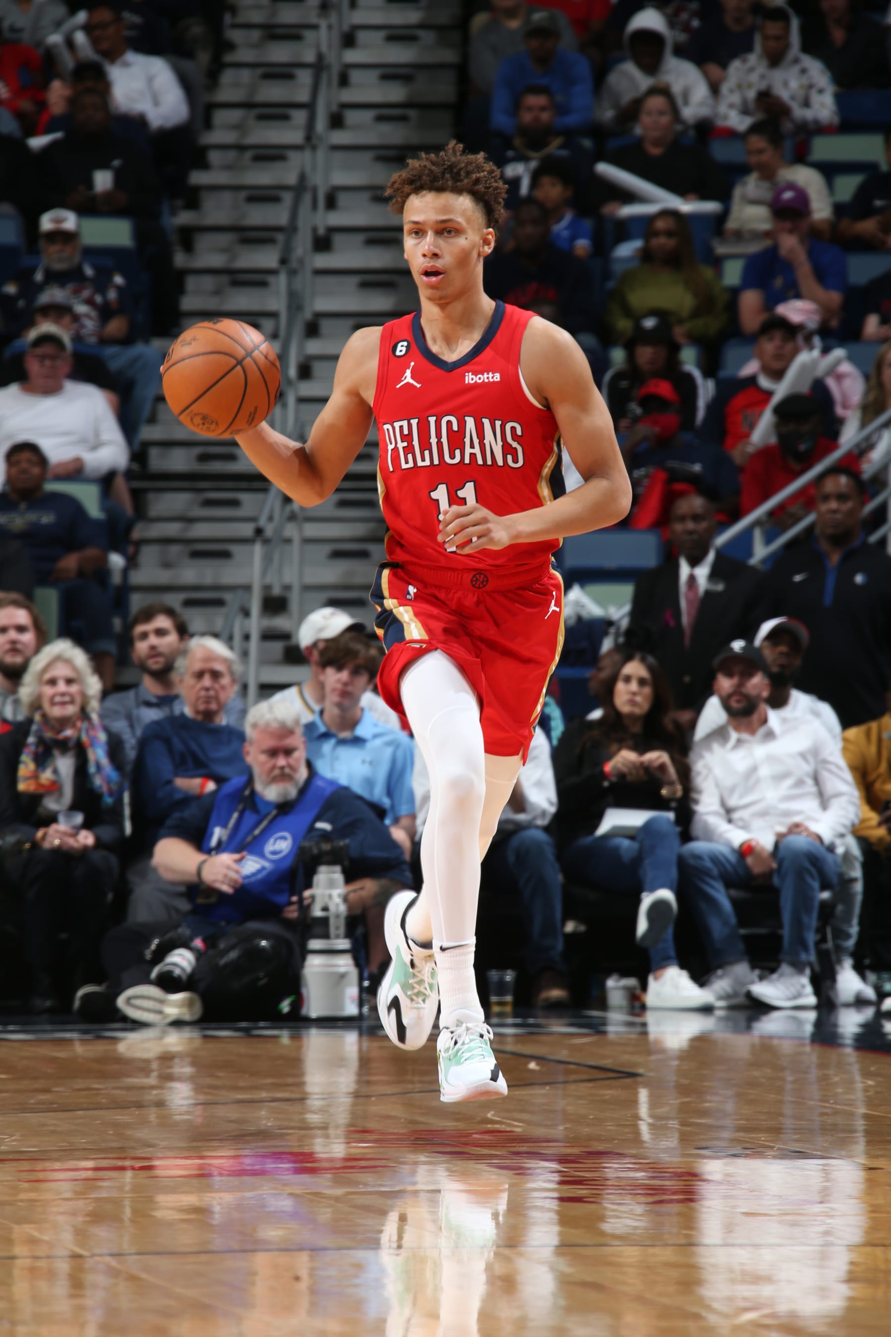 NEW ORLEANS, LA - OCTOBER 25: Dyson Daniels #11 of the New Orleans Pelicans dribbles the ball during the game against the Dallas Mavericks on October 25, 2022 at the Smoothie King Center in New Orleans, Louisiana. NOTE TO USER: User expressly acknowledges and agrees that, by downloading and or using this Photograph, user is consenting to the terms and conditions of the Getty Images License Agreement. Mandatory Copyright Notice: Copyright 2022 NBAE (Photo by Layne Murdoch Jr./NBAE via Getty Images)