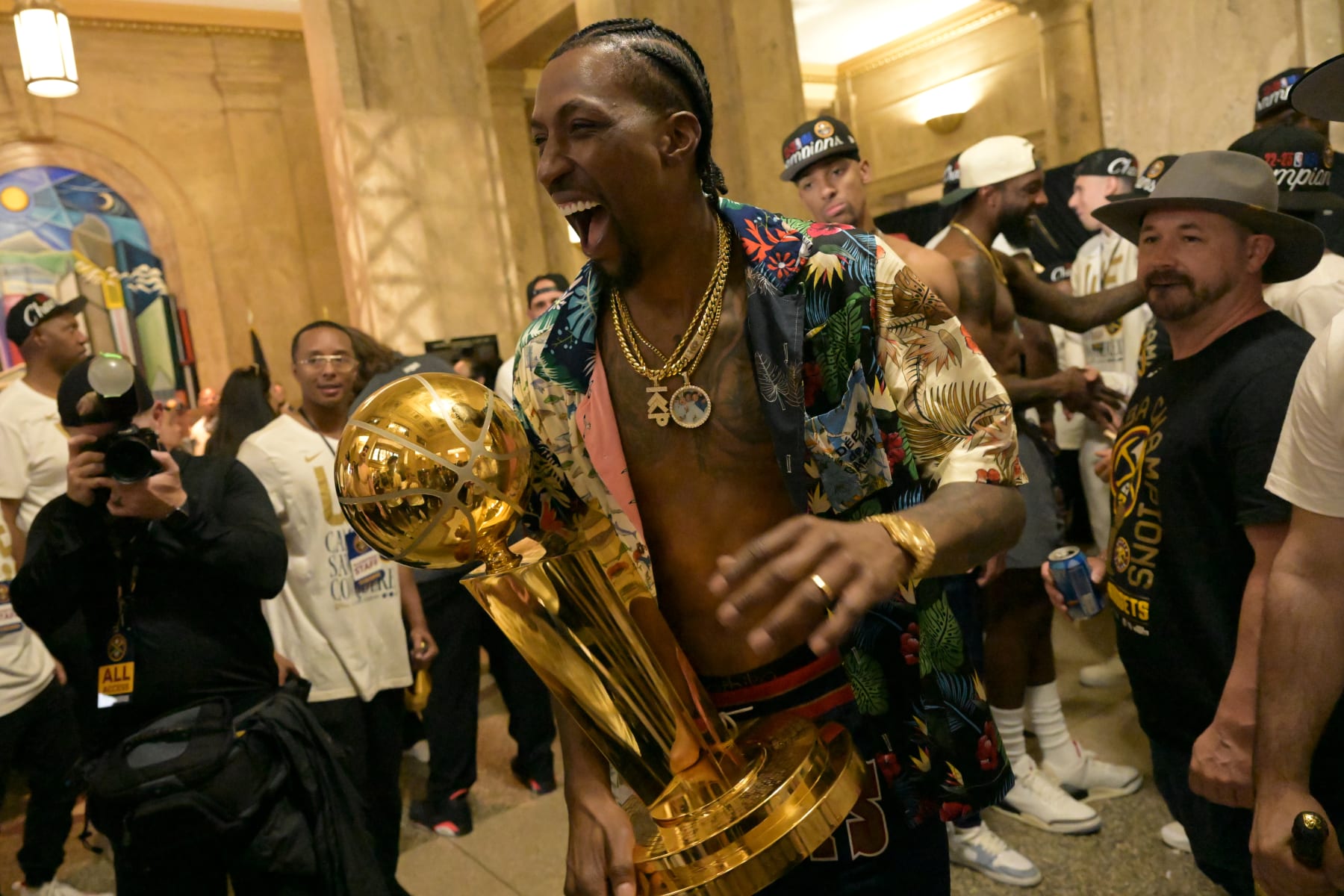 DENVER, CO - JUNE 15 : Kentavious Caldwell-Pope (5) of the Denver Nuggets arrives city and county building with NBA champion trophy at Civic Center Park in Denver, Colorado on Thursday, June 15, 2023. Denver Nuggets celebrates championship with thousands of fans downtown. (Photo by Hyoung Chang/The Denver Post)