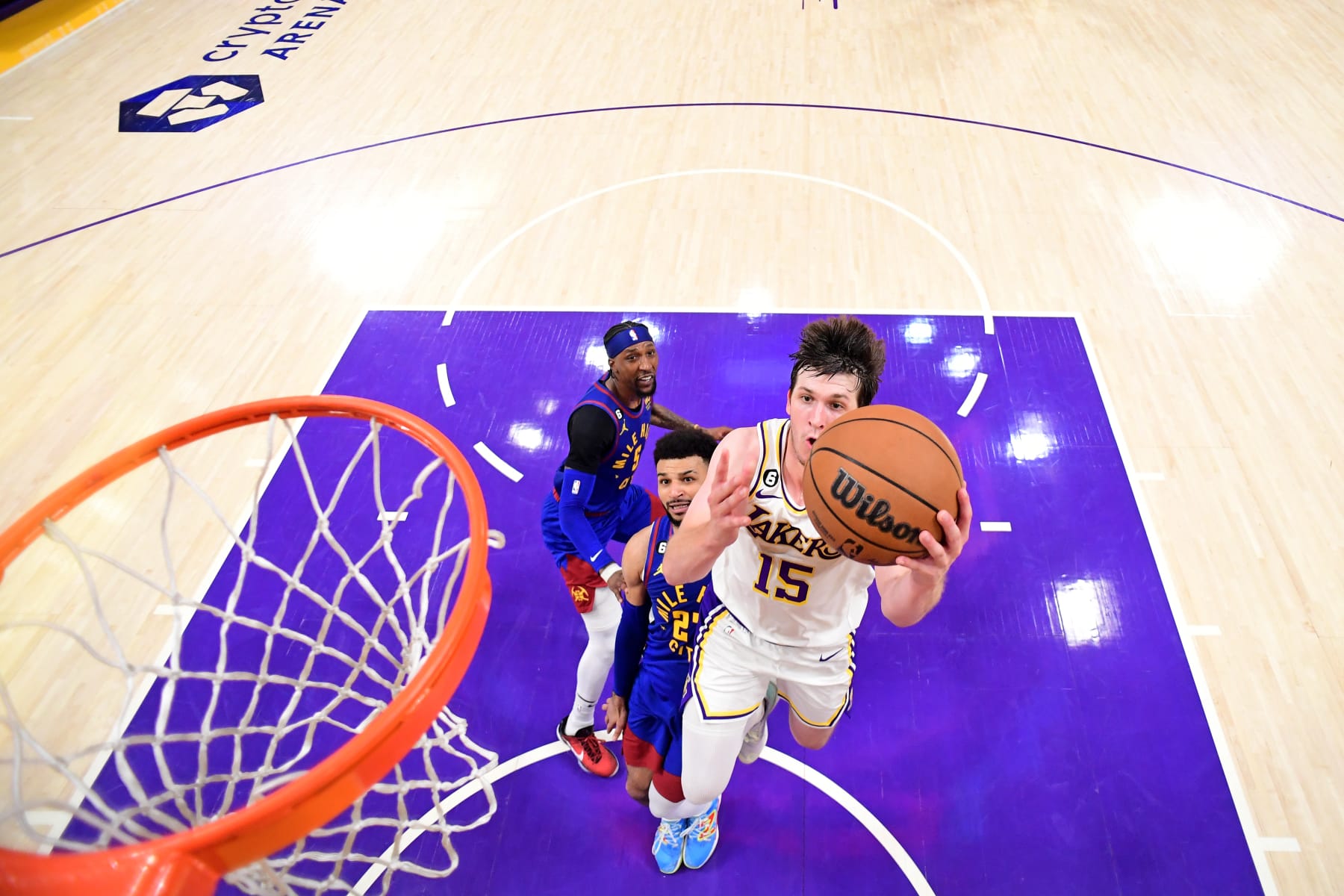 LOS ANGELES, CA - MAY 20: Austin Reaves #15 of the Los Angeles Lakers drives to the basket against the Denver Nuggets during Game Three of the Western Conference Finals on May 20, 2023 at Crypto.Com Arena in Los Angeles, California. NOTE TO USER: User expressly acknowledges and agrees that, by downloading and/or using this Photograph, user is consenting to the terms and conditions of the Getty Images License Agreement. Mandatory Copyright Notice: Copyright 2023 NBAE (Photo by Adam Pantozzi/NBAE via Getty Images)