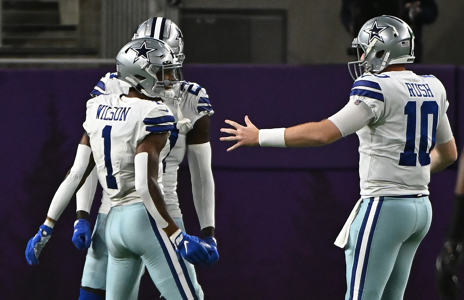 MINNEAPOLIS, MINNESOTA - OCTOBER 31: Ced Wilson #1 and Cooper Rush #10 of the Dallas Cowboys celebrate a 73-yard touchdown against the Minnesota Vikings during the third quarter at U.S. Bank Stadium on October 31, 2021 in Minneapolis, Minnesota. (Photo by Stephen Maturen/Getty Images)