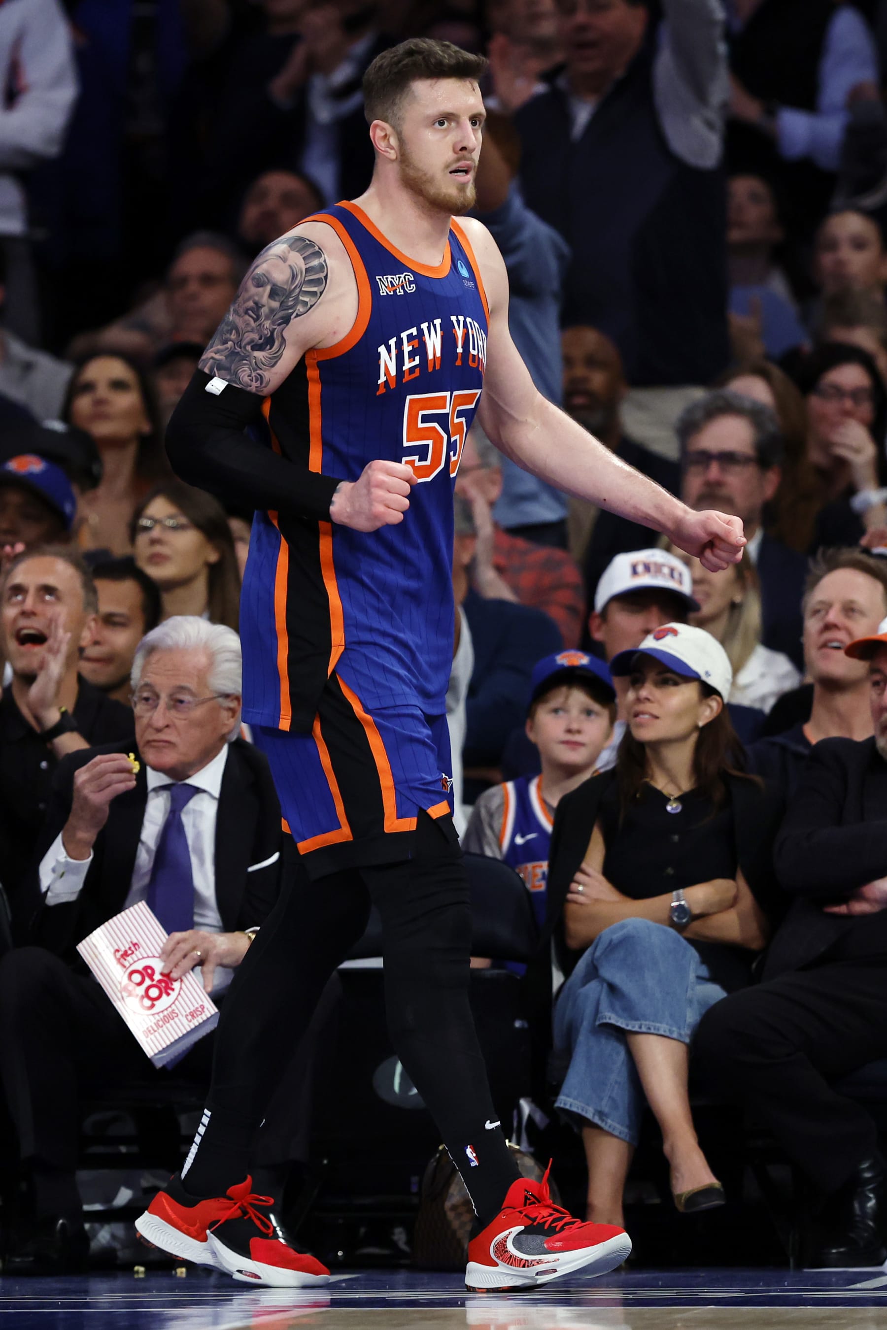NEW YORK, NEW YORK - MAY 14: Isaiah Hartenstein #55 of the New York Knicks looks on during Game Five of the Eastern Conference Second Round Playoffs against the Indiana Pacers at Madison Square Garden on May 14, 2024 in New York City. The Knicks won 121-91. NOTE TO USER: User expressly acknowledges and agrees that, by downloading and or using this photograph, User is consenting to the terms and conditions of the Getty Images License Agreement. (Photo by Sarah Stier/Getty Images)