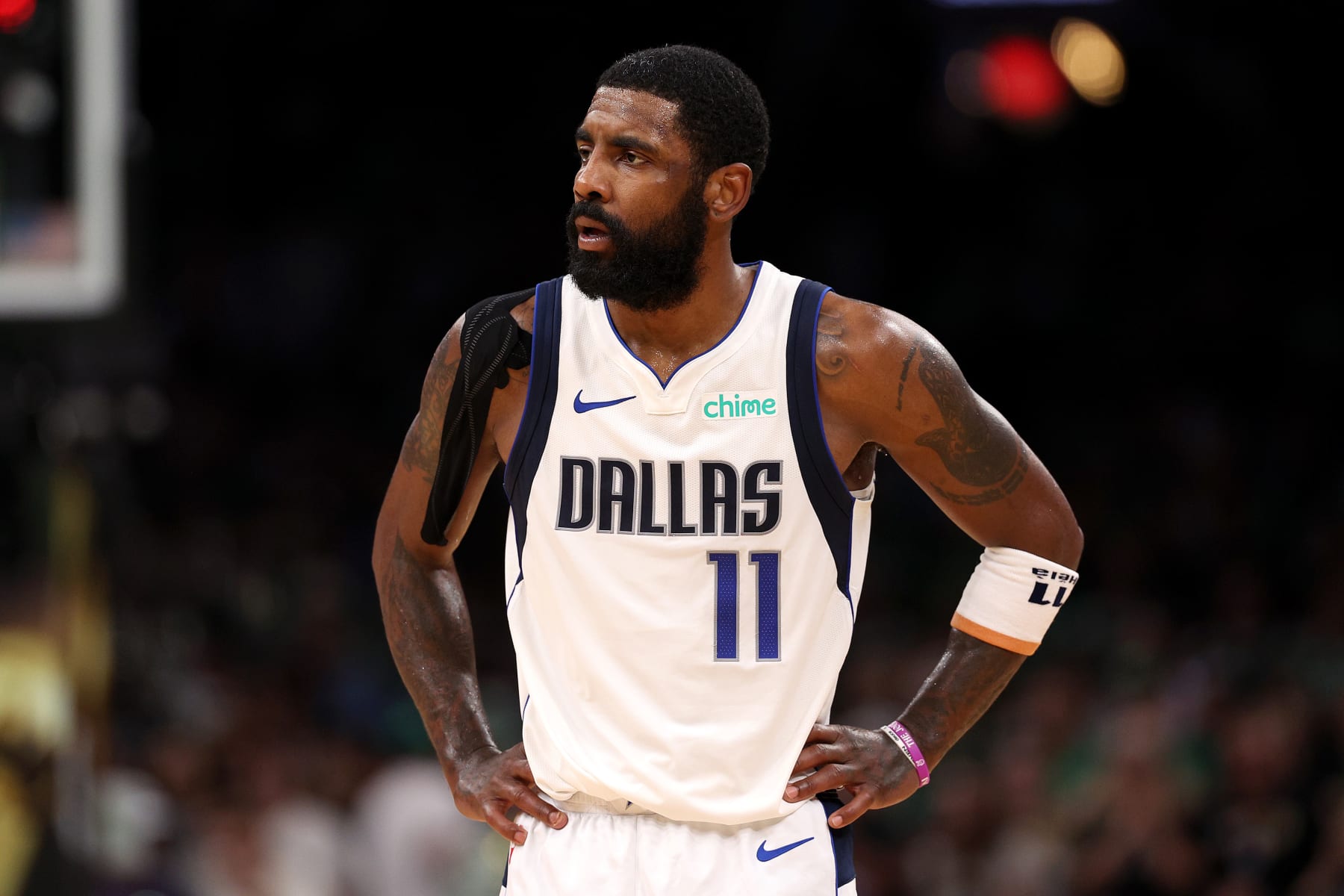 BOSTON, MASSACHUSETTS - JUNE 17: Kyrie Irving #11 of the Dallas Mavericks looks on during the second quarter of Game Five of the 2024 NBA Finals against the Boston Celtics at TD Garden on June 17, 2024 in Boston, Massachusetts. NOTE TO USER: User expressly acknowledges and agrees that, by downloading and or using this photograph, User is consenting to the terms and conditions of the Getty Images License Agreement. (Photo by Elsa/Getty Images)