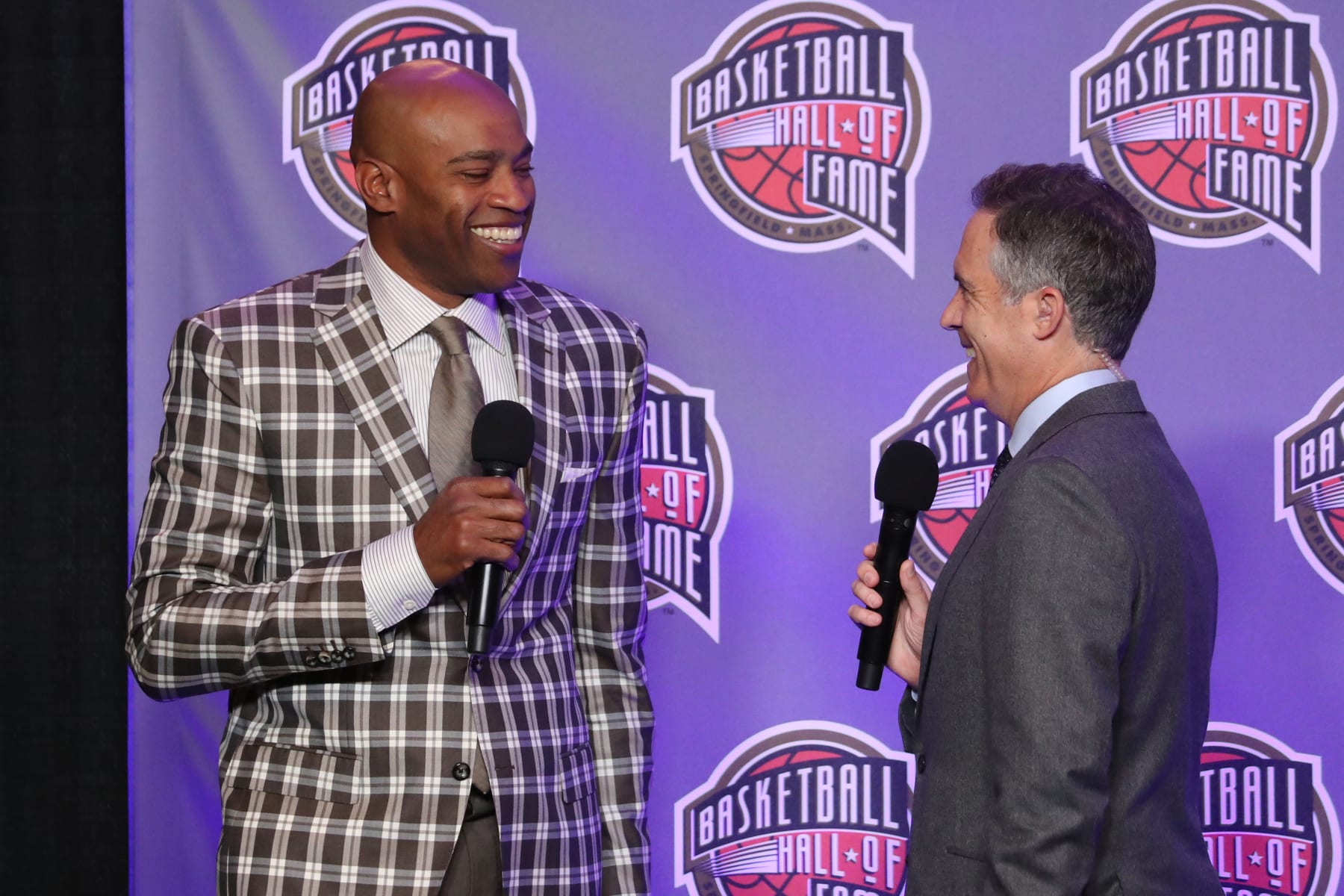 INDIANAPOLIS, IN - FEBRUARY 16: Vince Carter speaks with Matt Winer during the Hall of Fame Press Conference as part of NBA All-Star Weekend on Friday, February 16, 2024 at Lucas Oil Stadium in Indianapolis, Indiana. NOTE TO USER: User expressly acknowledges and agrees that, by downloading and/or using this Photograph, user is consenting to the terms and conditions of the Getty Images License Agreement. Mandatory Copyright Notice: Copyright 2024 NBAE (Photo by Gary Dineen/NBAE via Getty Images)
