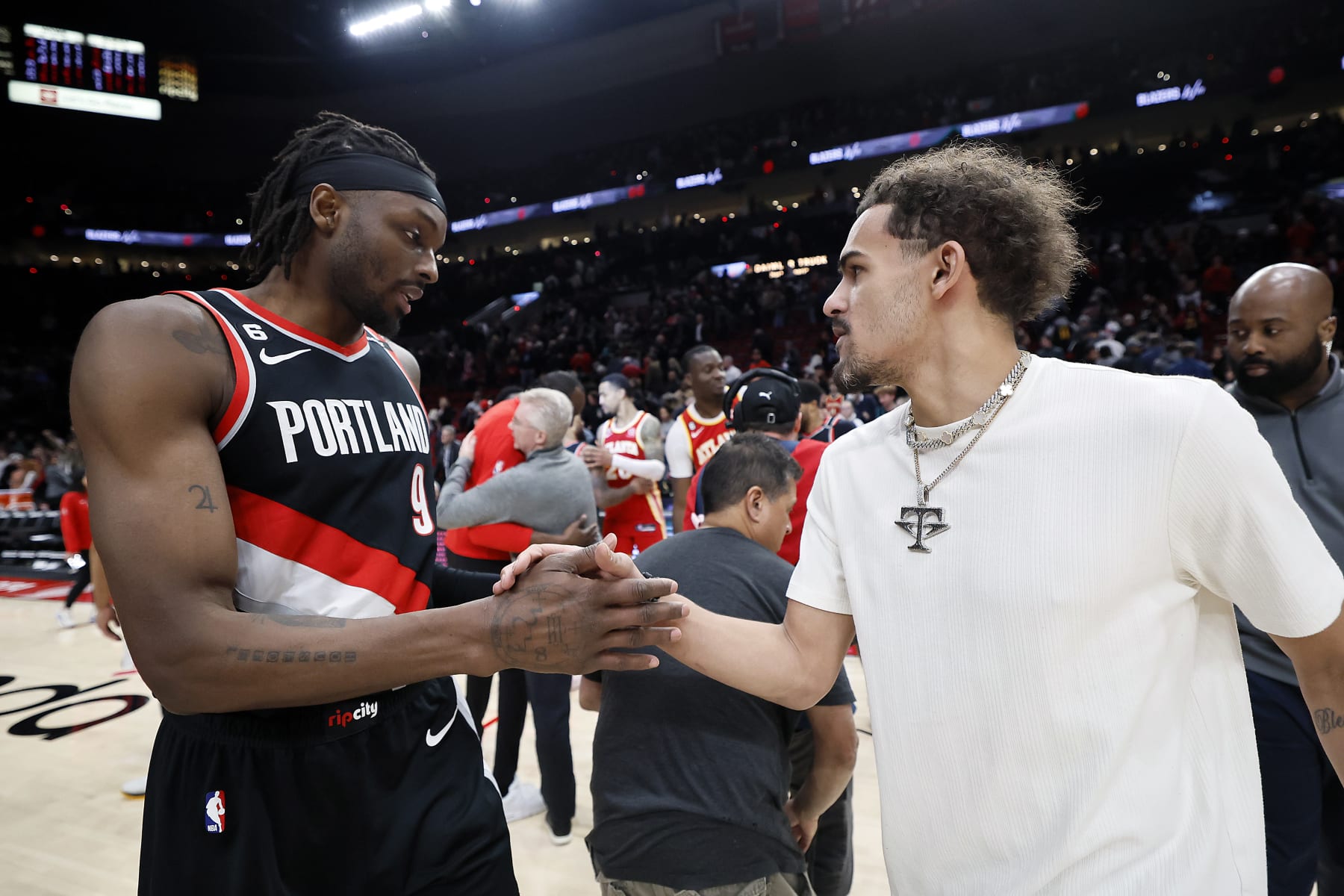 PORTLAND, OREGON - JANUARY 30: Jerami Grant #9 of the Portland Trail Blazers and Trae Young #11 of the Atlanta Hawks meet after the  game at Moda Center on January 30, 2023 in Portland, Oregon. NOTE TO USER: User expressly acknowledges and agrees that, by downloading and or using this photograph, User is consenting to the terms and conditions of the Getty Images License Agreement.  (Photo by Soobum Im/Getty Images)