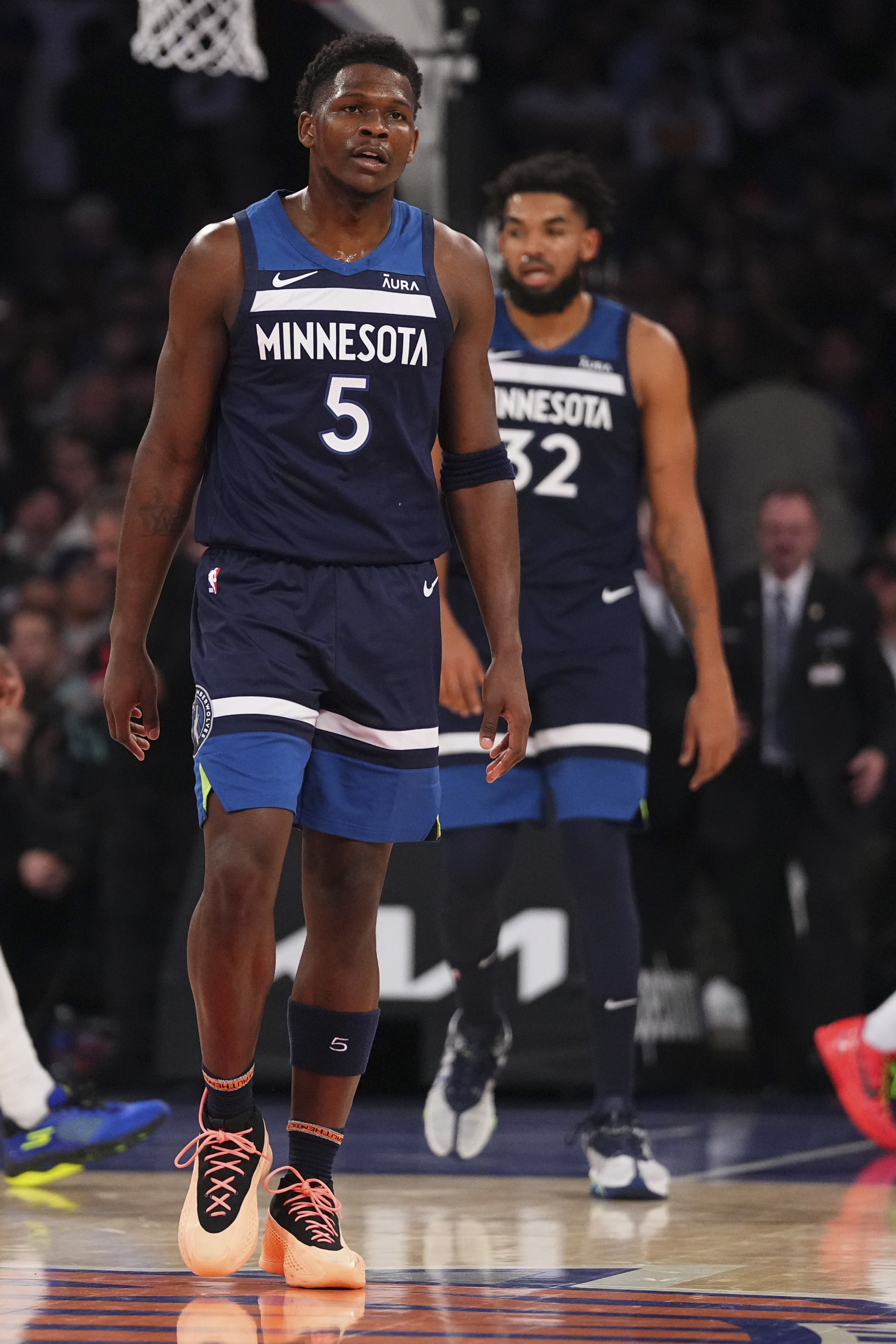 NEW YORK, NEW YORK - JANUARY 1: Anthony Edwards #5 and Karl-Anthony Towns #32 of the Minnesota Timberwolves look on against the New York Knicks at Madison Square Garden on January 1, 2024 in New York City. The Knicks defeated the Timberwolves 112-106. NOTE TO USER: User expressly acknowledges and agrees that, by downloading and or using this photograph, User is consenting to the terms and conditions of the Getty Images License Agreement. (Photo by Mitchell Leff/Getty Images)