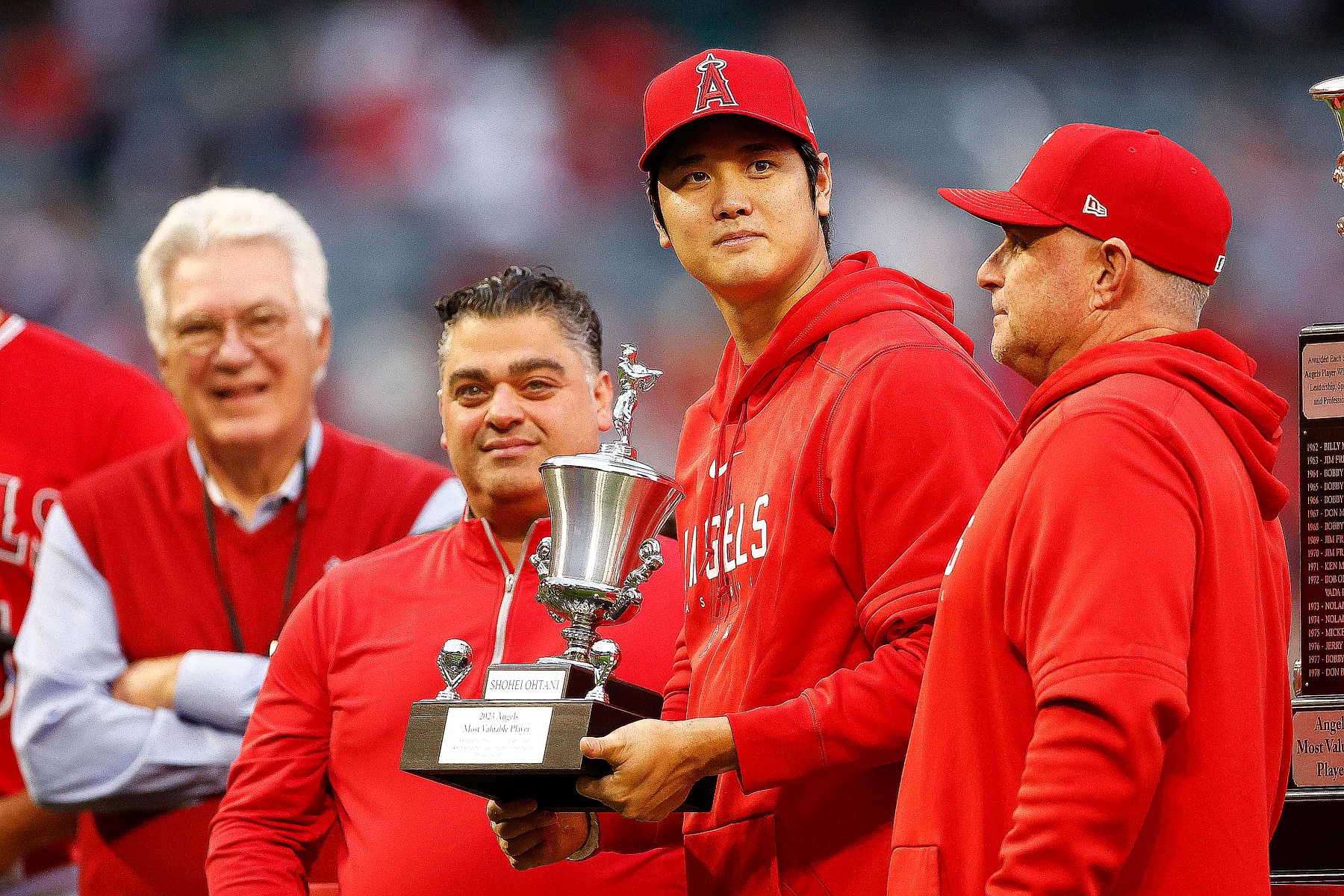 ANAHEIM, CALIFORNIA - SEPTEMBER 30:  Shohei Ohtani #17 of the Los Angeles Angels holds the 2023 Los Angeles Angels Most Valuable Player trophy before a game against the Oakland Athletics at Angel Stadium of Anaheim on September 30, 2023 in Anaheim, California. (Photo by Ronald Martinez/Getty Images)