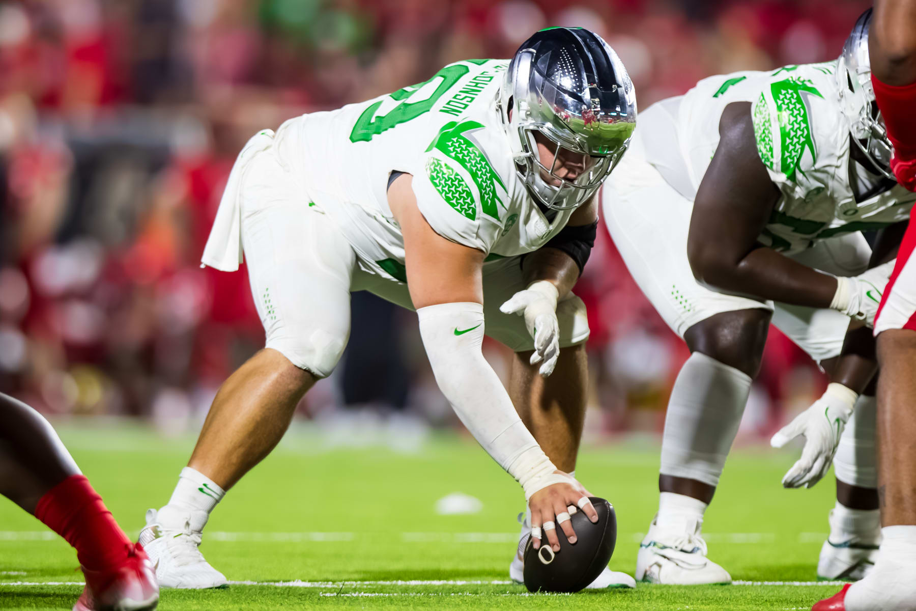LUBBOCK, TEXAS - SEPTEMBER 09: Jackson Powers-Johnson #58 of the Oregon Ducks lines up over the ball during the second half of the game against the Texas Tech Red Raiders at Jones AT&T Stadium on September 09, 2023 in Lubbock, Texas. (Photo by John E. Moore III/Getty Images)