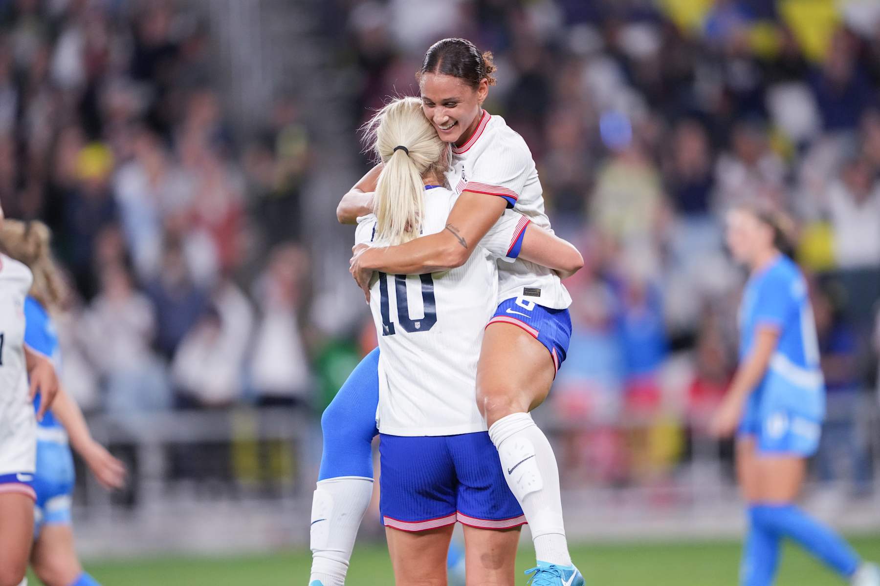 NASHVILLE, TENNESSEE - OCTOBER 27: Lindsey Horan #10 of the United States celebrates scoring with teammate Lynn Williams #6 of the United States during the second half against Iceland at GEODIS Park on October 27, 2024 in Nashville, Tennessee. (Photo by John Wilkinson/ISI Photos/USSF/Getty Images for USSF)