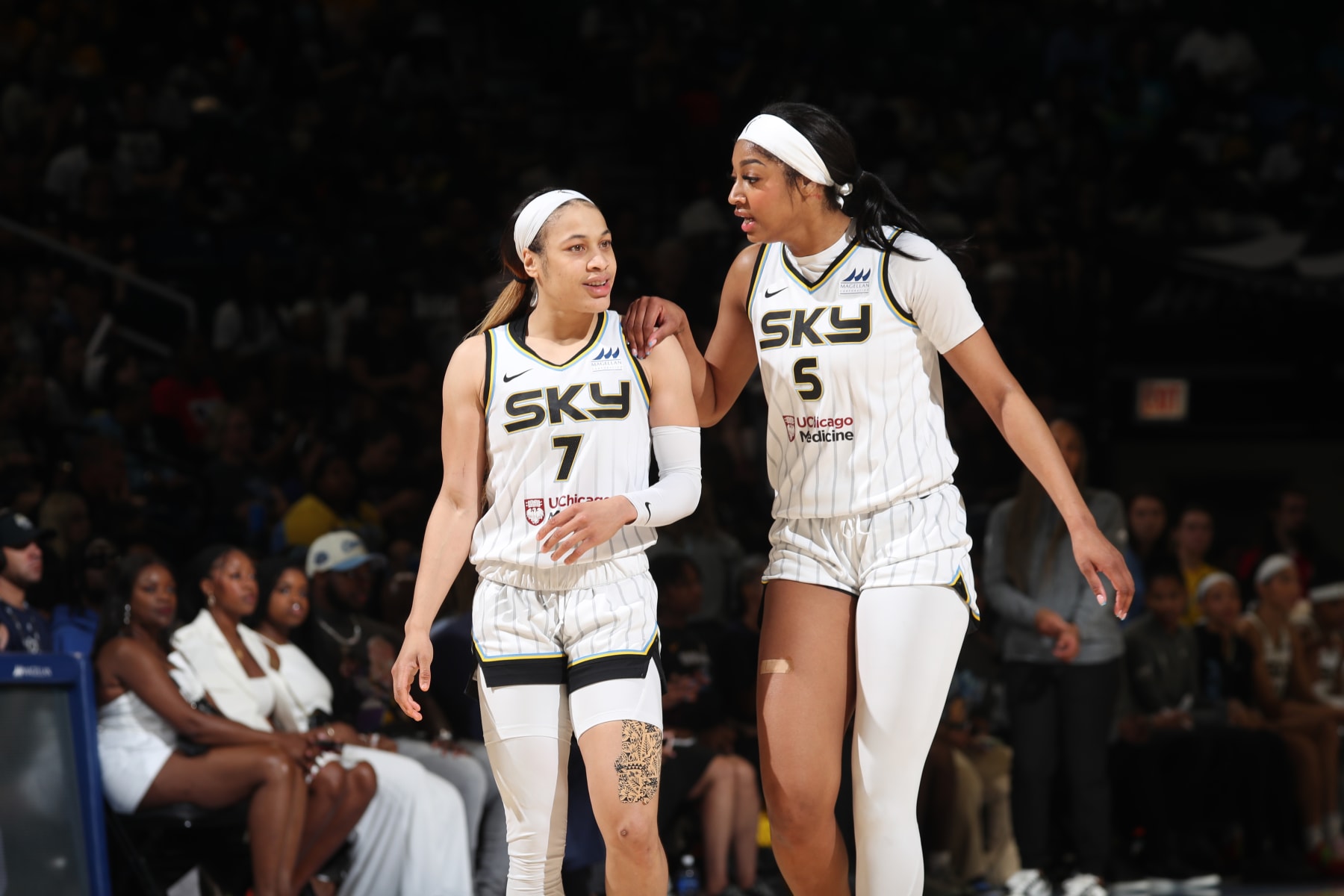 CHICAGO, IL -  JUNE 20: Chennedy Carter #7 talks to Angel Reese #5 of the Chicago Sky during the game against the Dallas Wings on June 20, 2024 at the Wintrust Arena in Chicago, IL. NOTE TO USER: User expressly acknowledges and agrees that, by downloading and or using this photograph, User is consenting to the terms and conditions of the Getty Images License Agreement. Mandatory Copyright Notice: Copyright 2024 NBAE (Photo by Gary Dineen/NBAE via Getty Images)